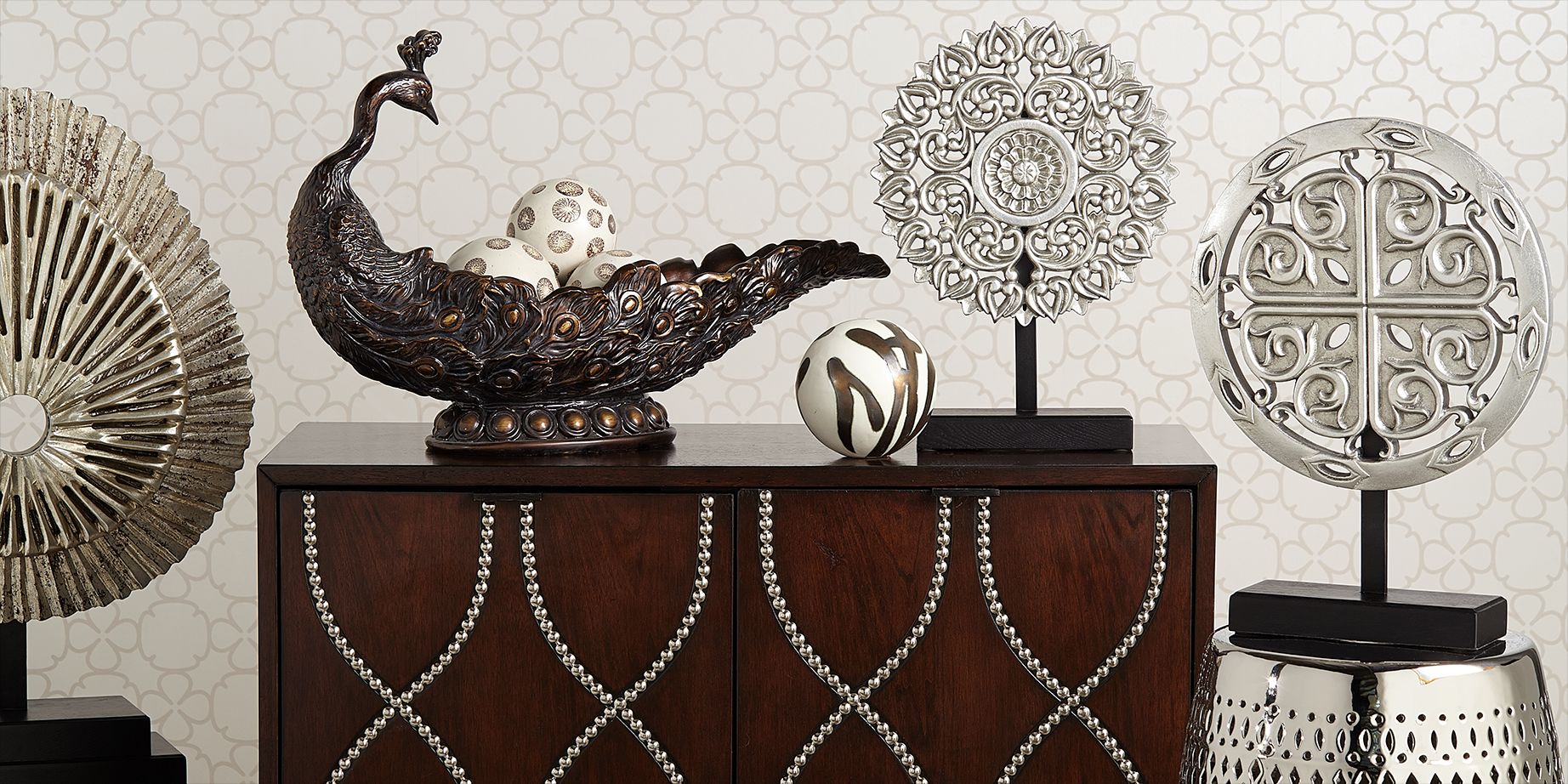 Save up to 65% on consoles, chests, and accent pieces in our home decor sale.