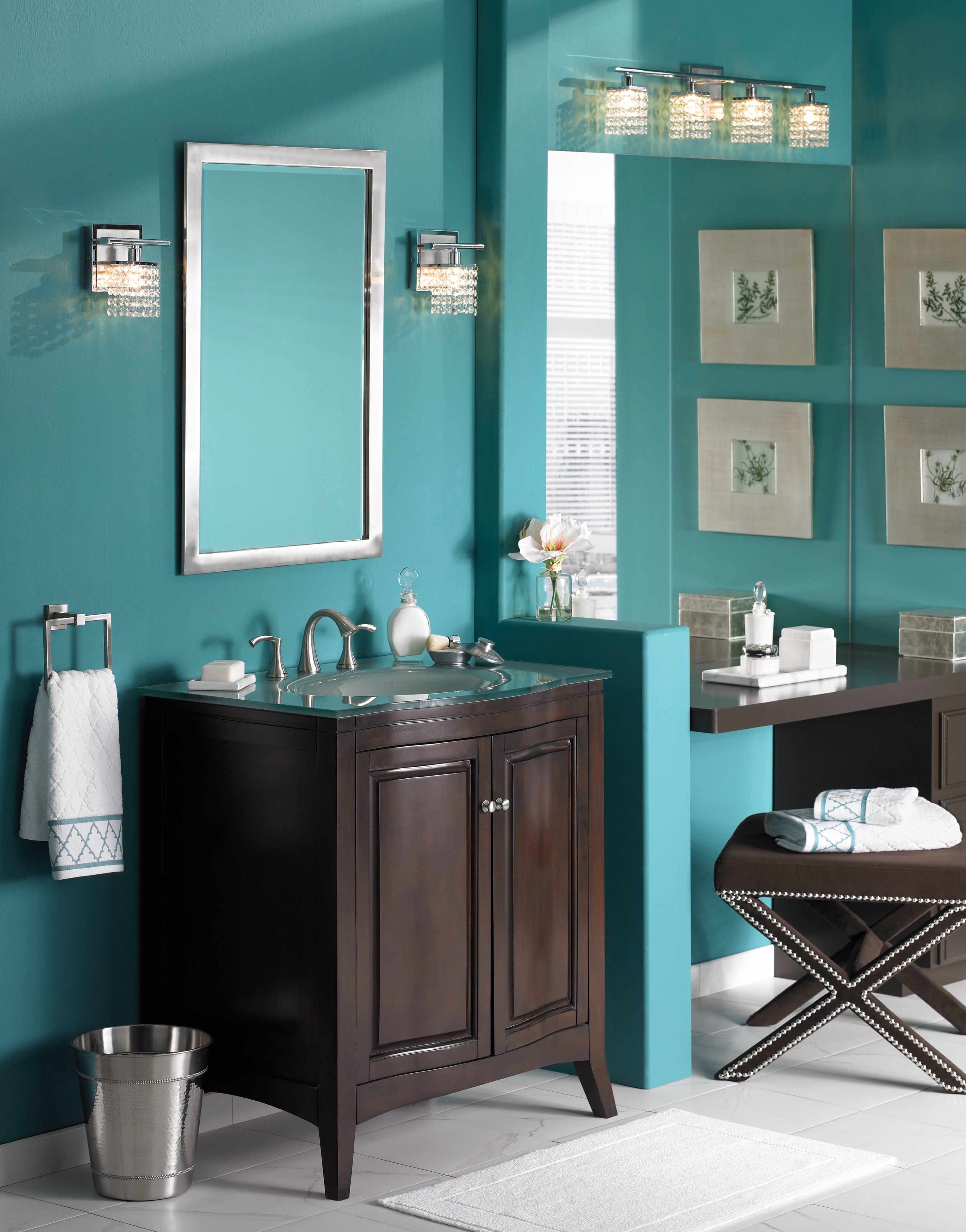 Transform your bath with a contemporary pop of color and bright lighting.