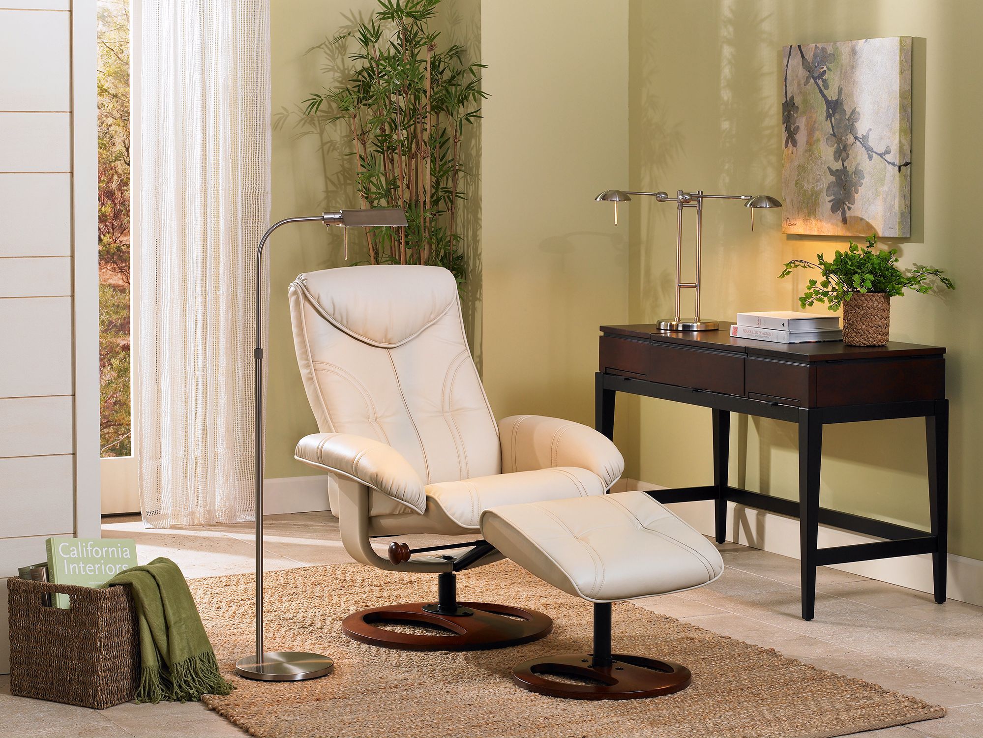 Kick your feet up in the swivel recliner with coordinating ottoman.