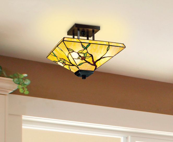 Tiffany-style glass is a charming detail in this hallway lighting fixture.