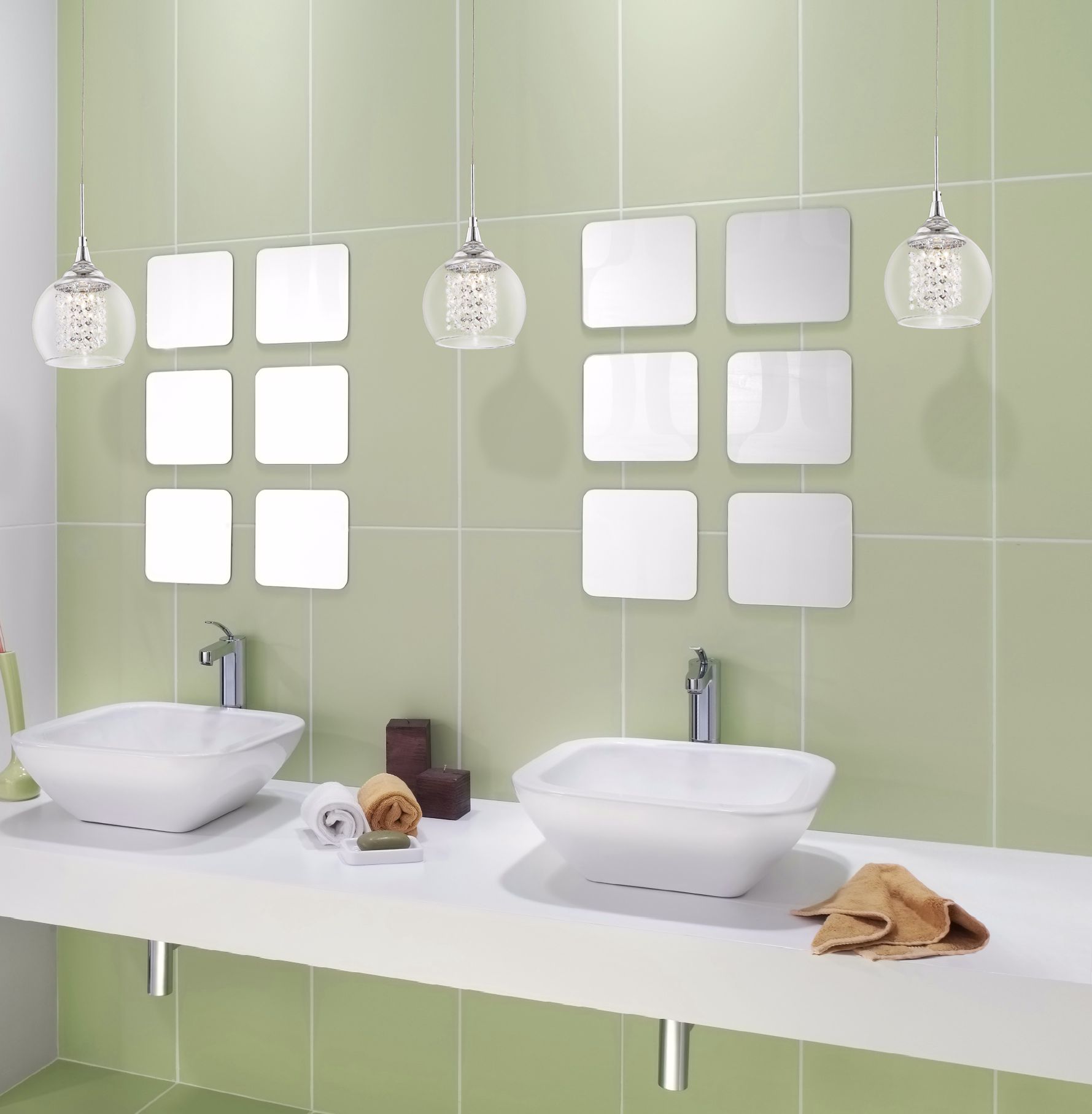 A trio of crystal pendants accents this contemporary bathroom picture