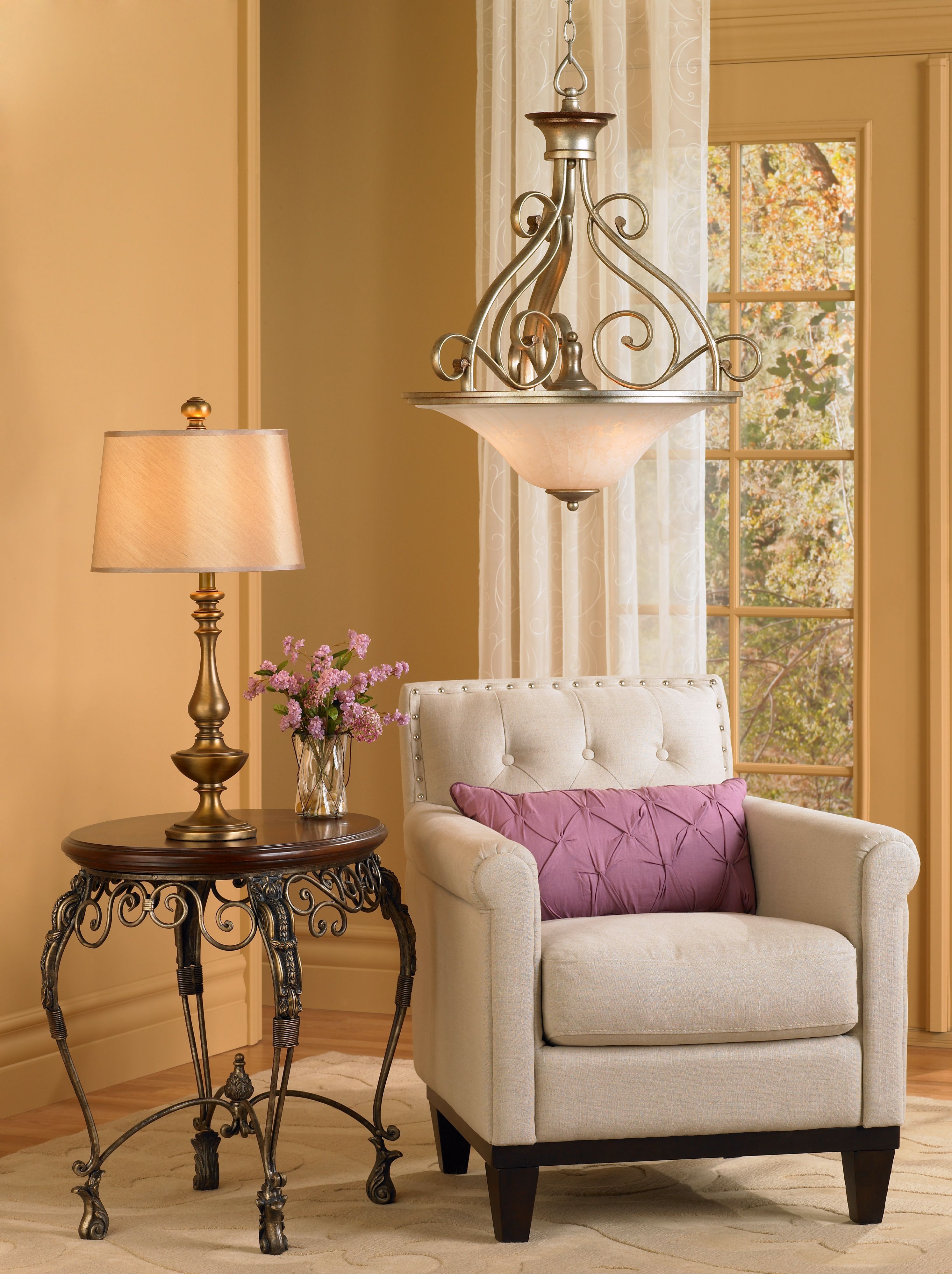 The calming contemporary living room scene is accented with lavender accents.