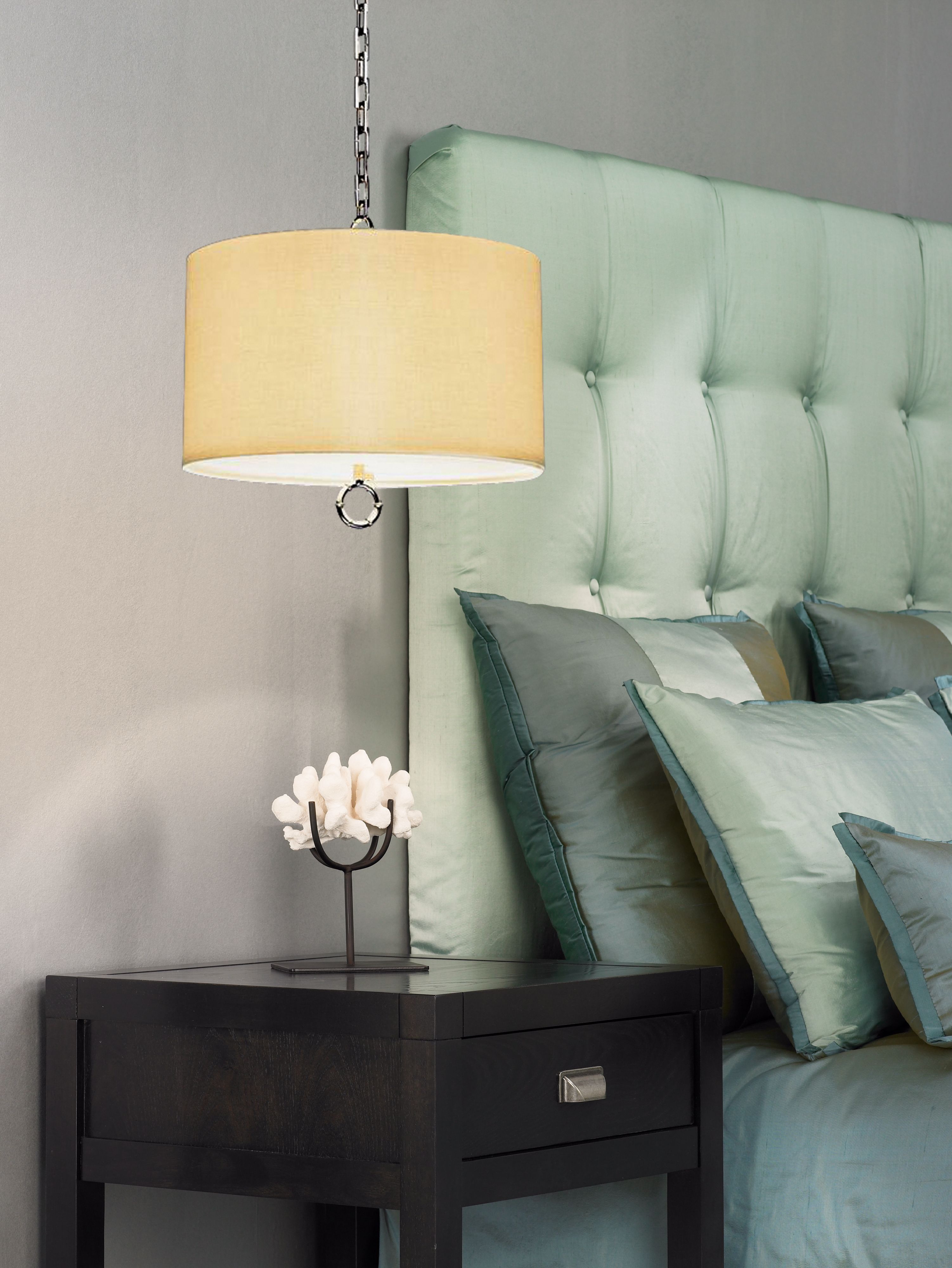 Create a distinctive bedside glow with pendant lights.
