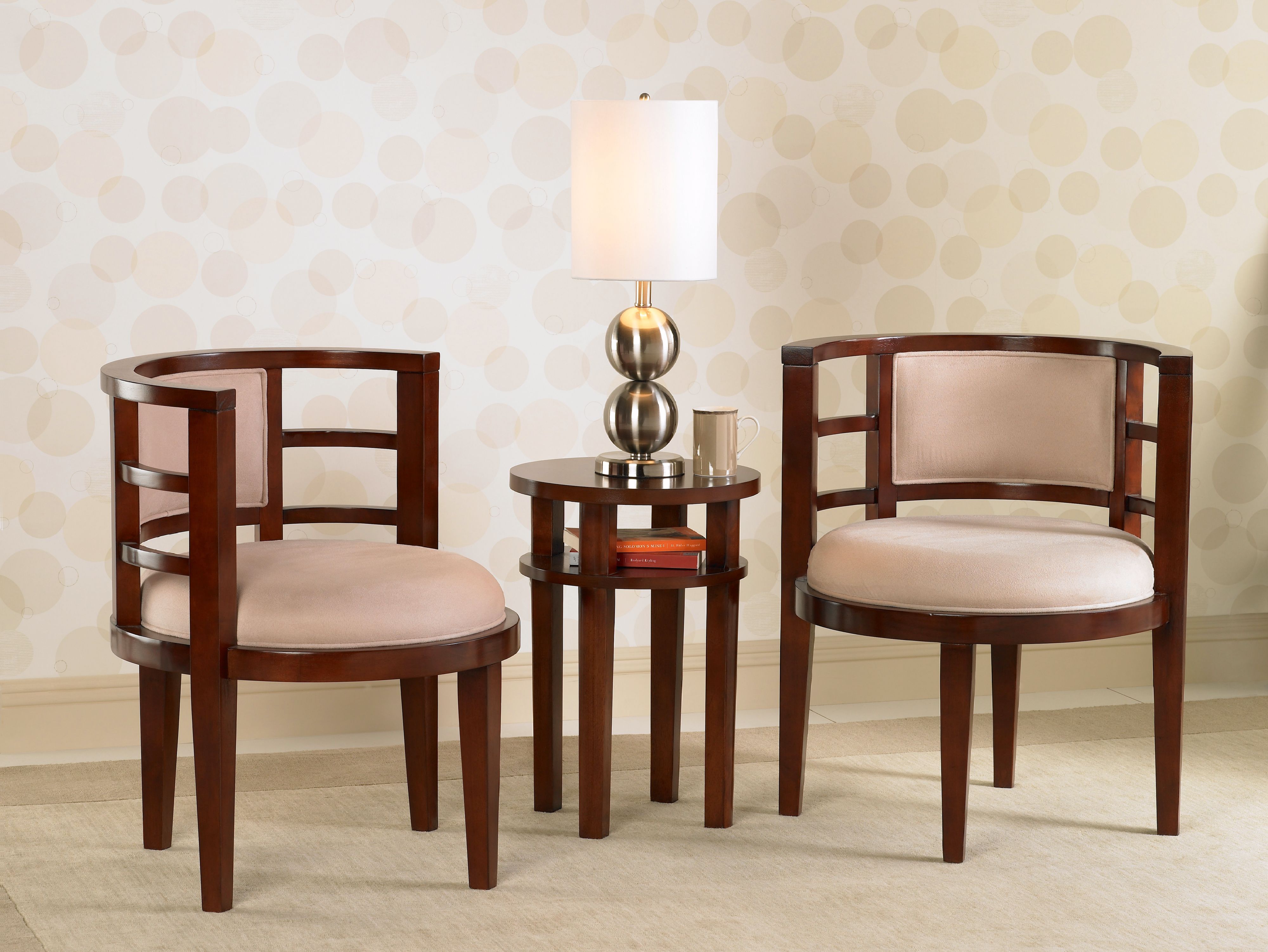 A charming seating area is featured in this contemporary curved chair picture.