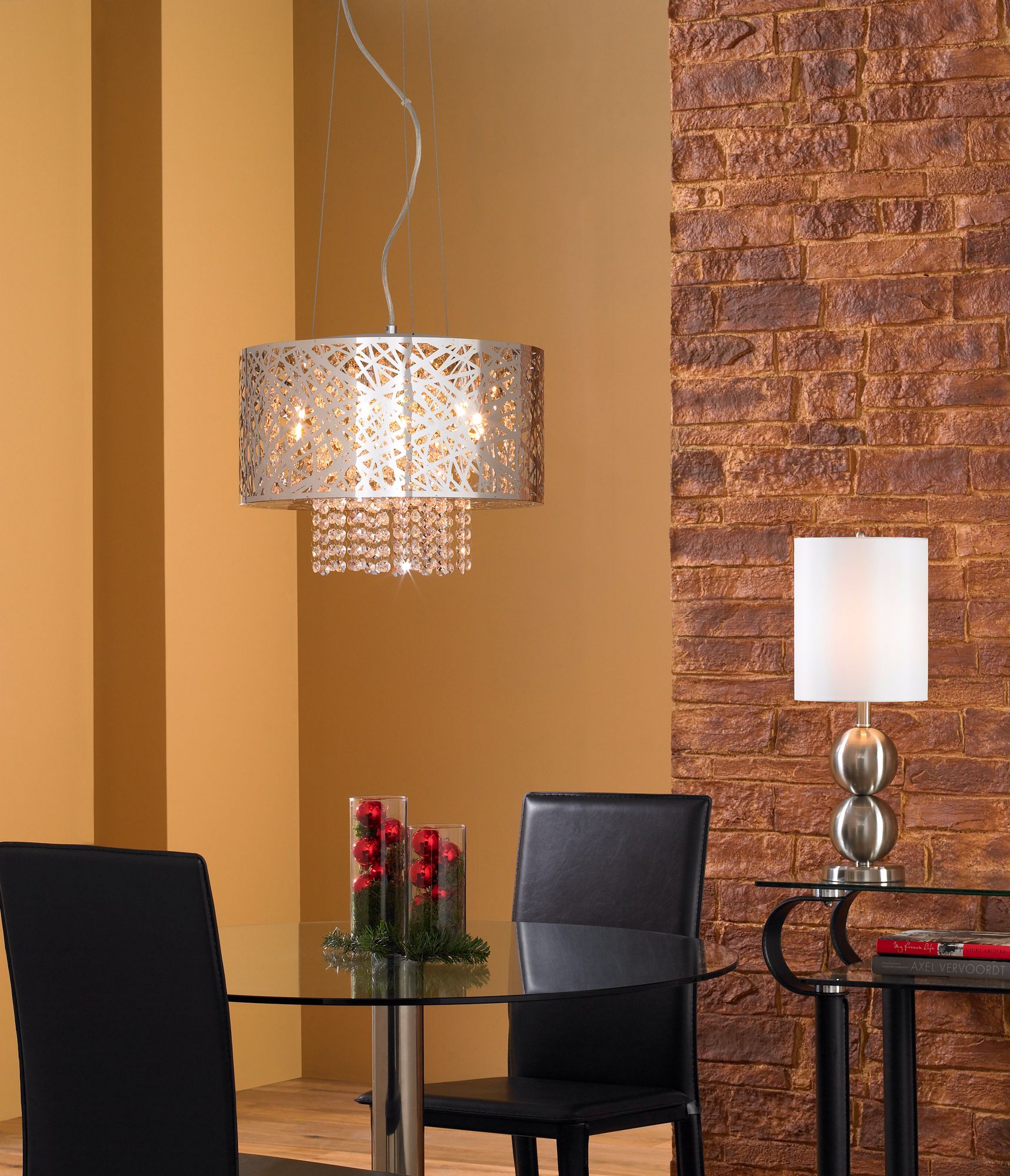 A metal and crystal chandelier is a showstopper in a modern dining room.