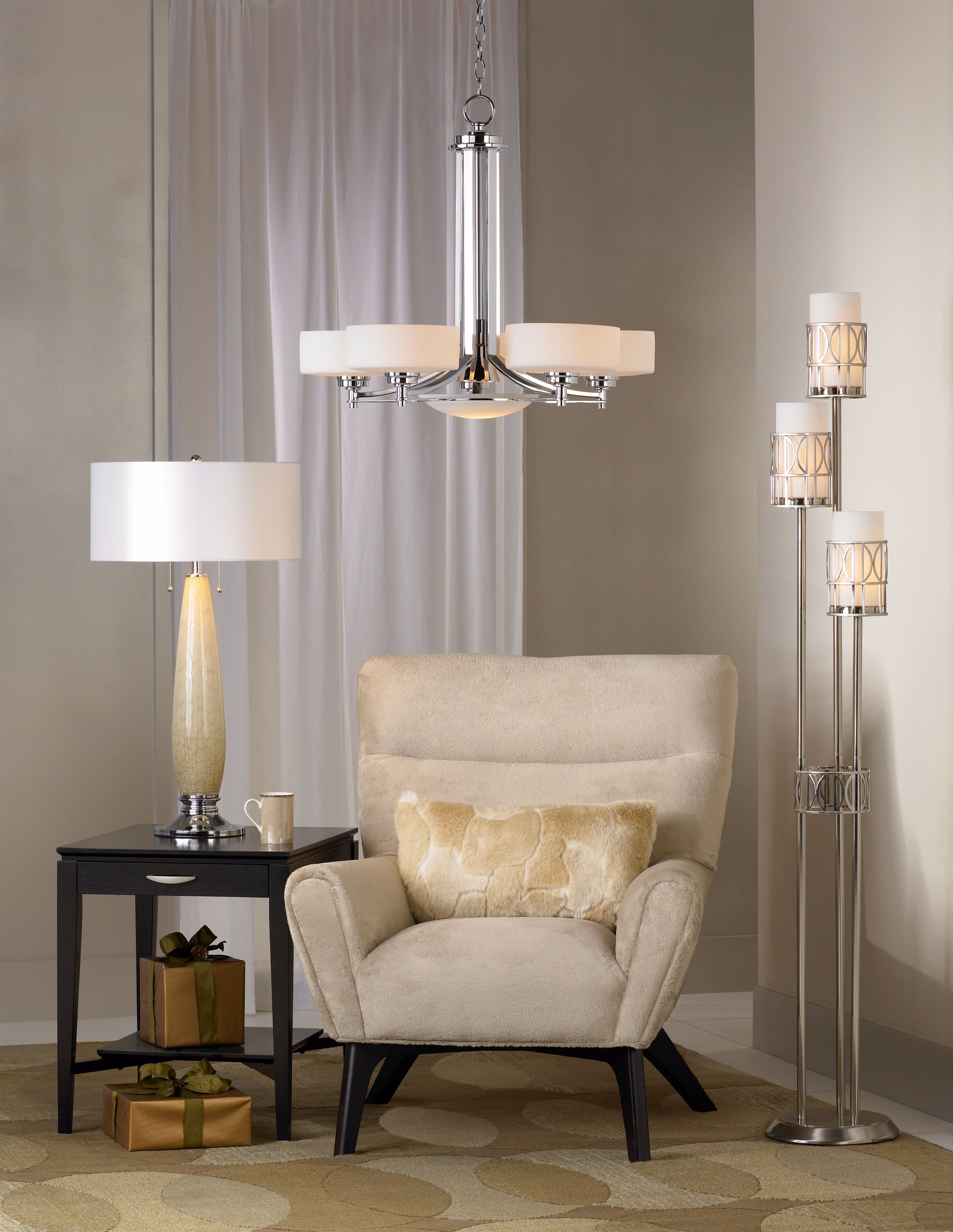 Modern furniture and lighting creates a unified look in this chic living room.