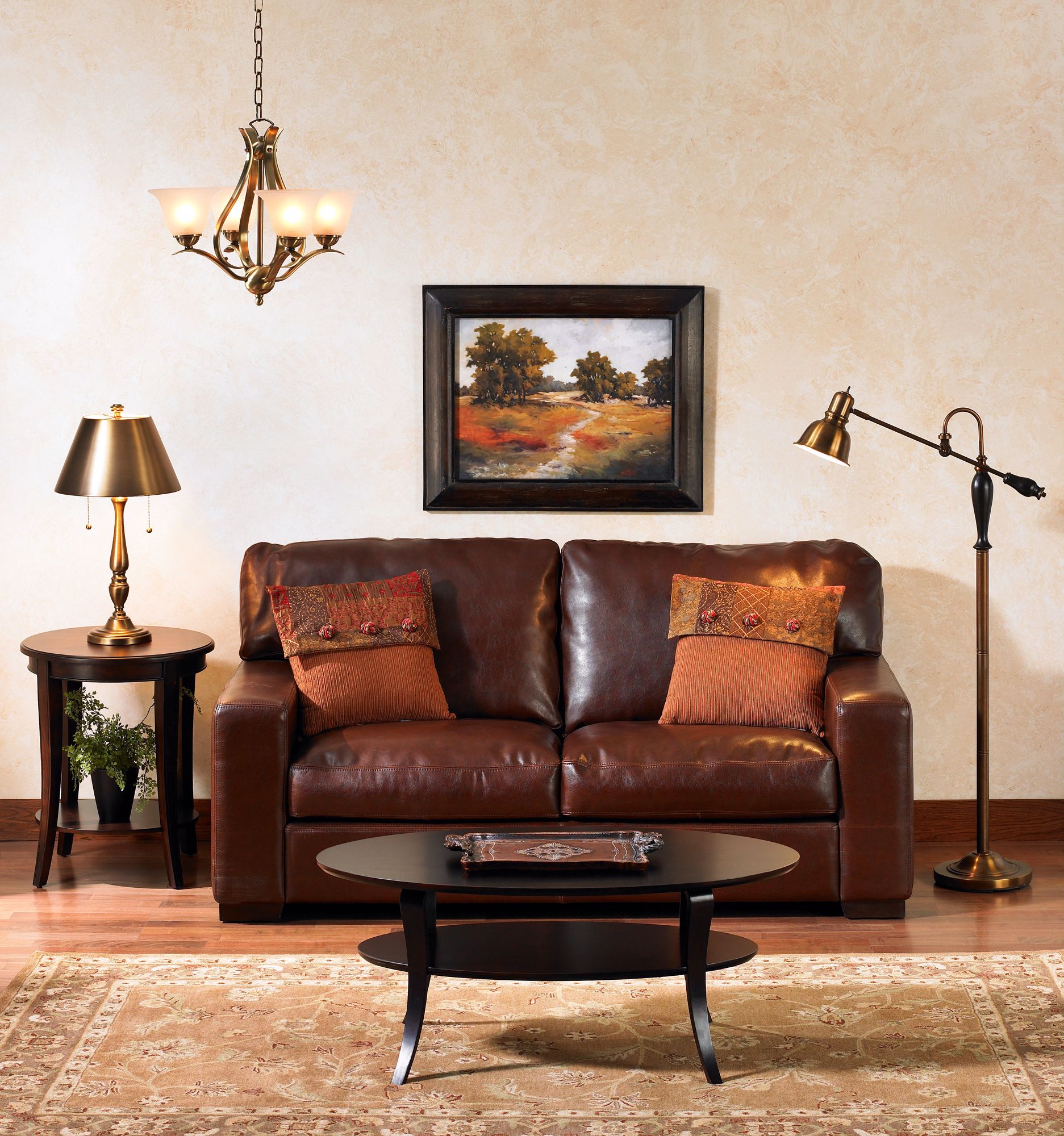 A traditional living room design with a leather sofa as the focal point.