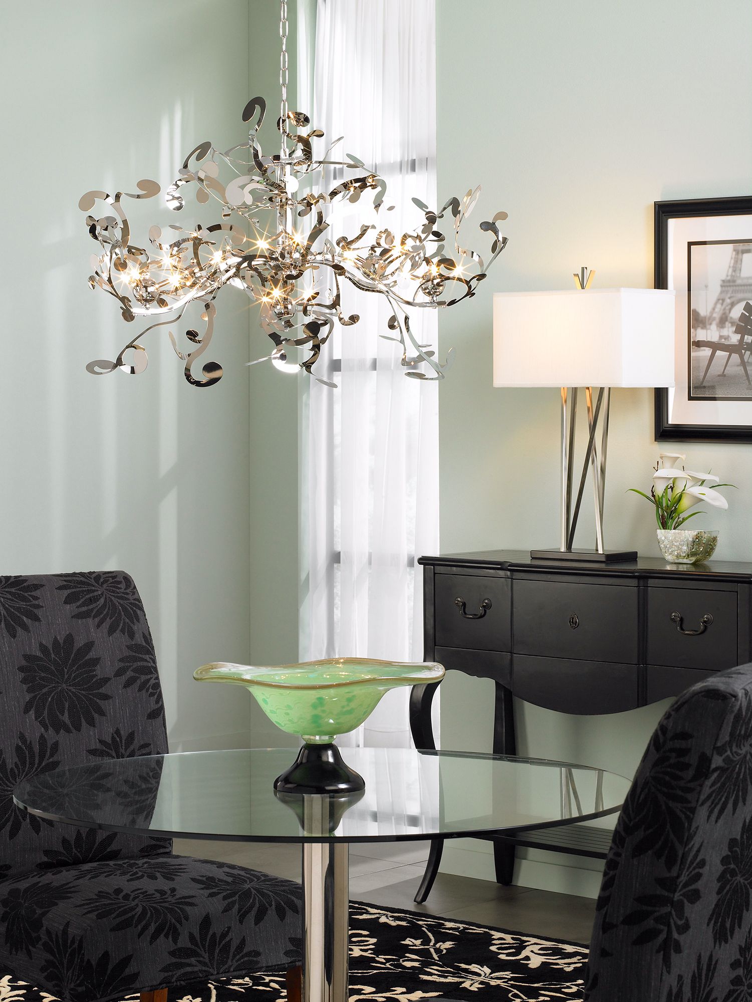 A modern luxe scene with whimsical patterns and rich black hues.