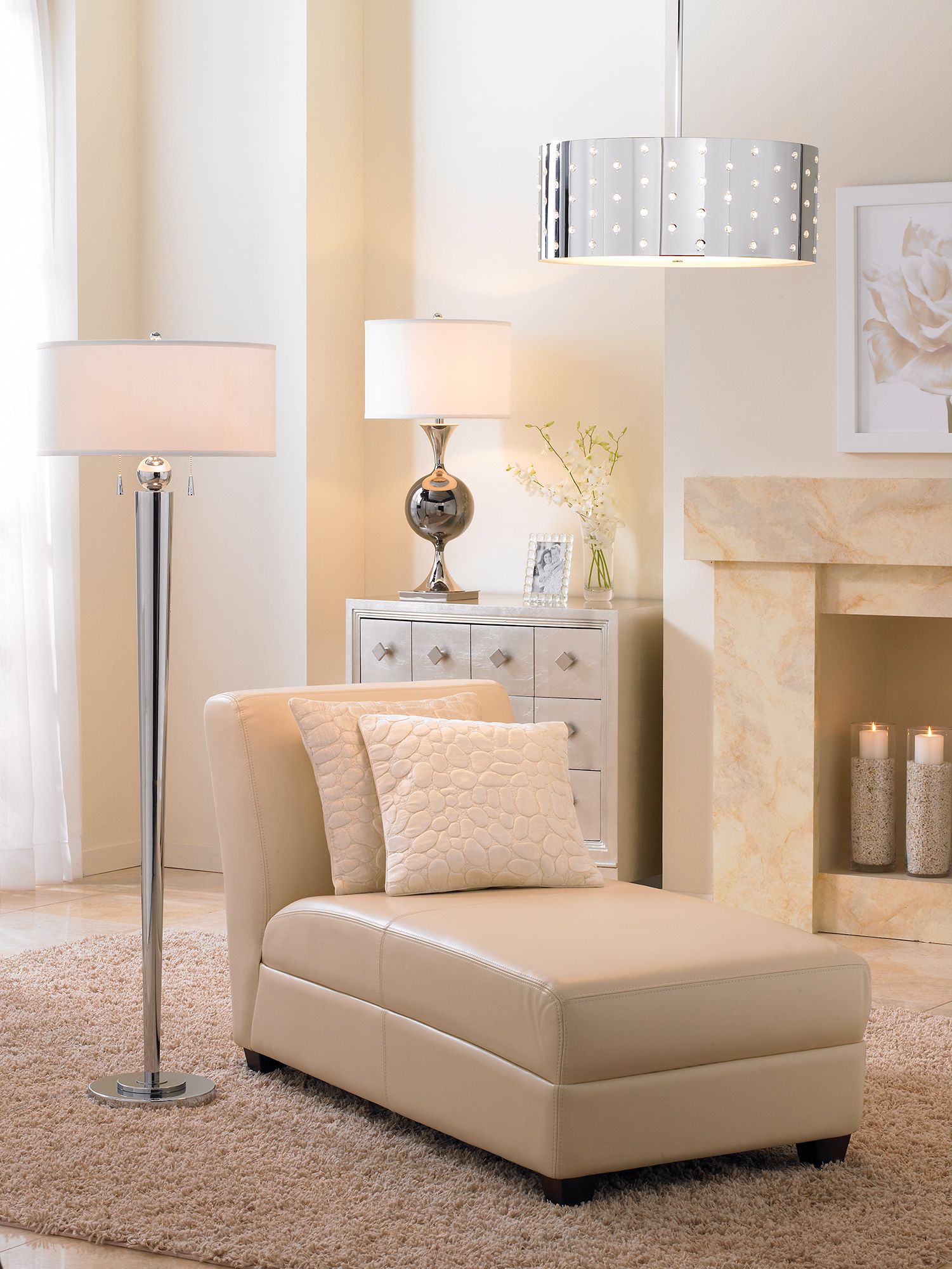 The chrome and warm cream hues make up the contemporary living room.