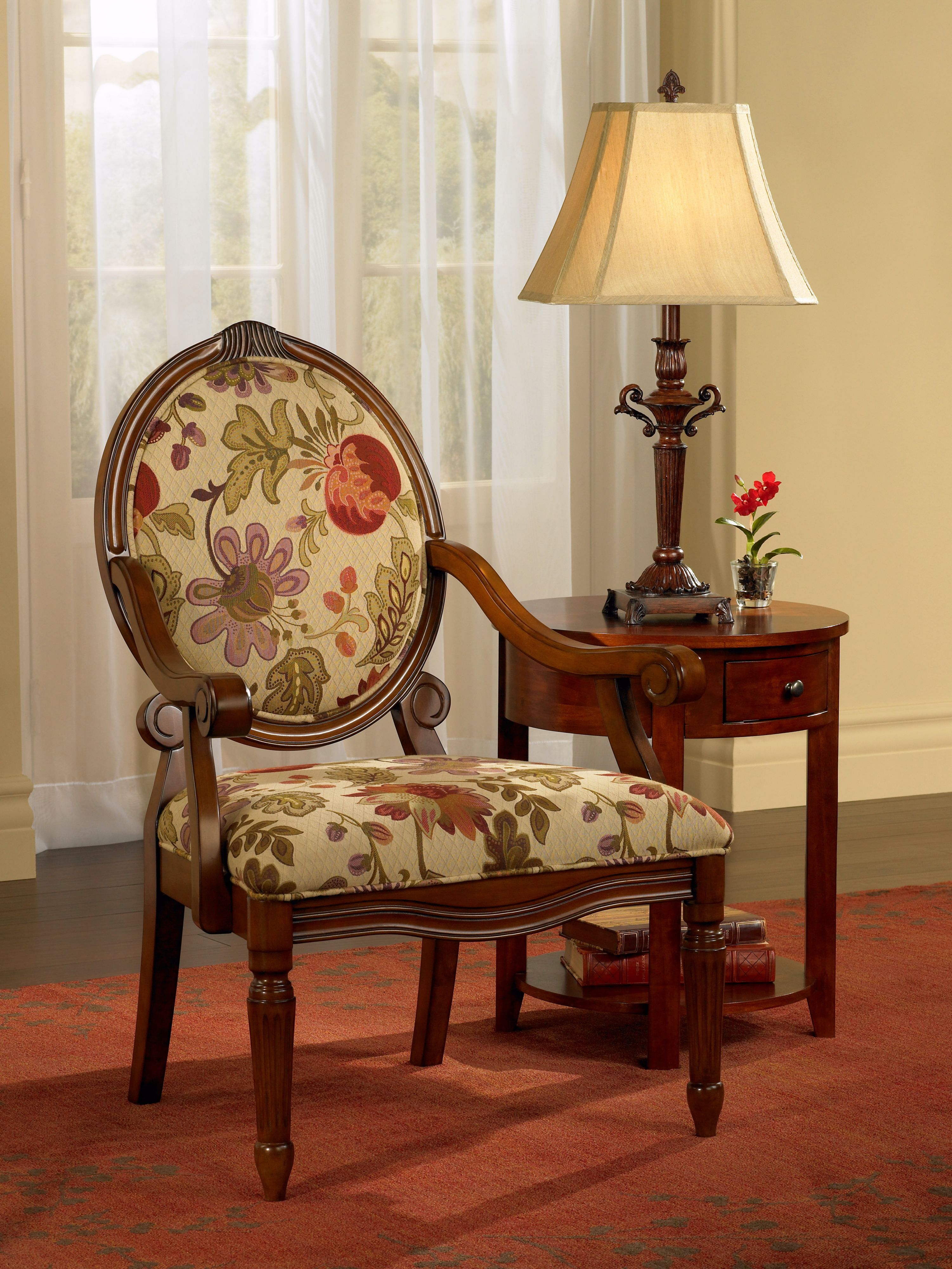 A traditional chair with a dramatic floral print is the gorgeous focal point.