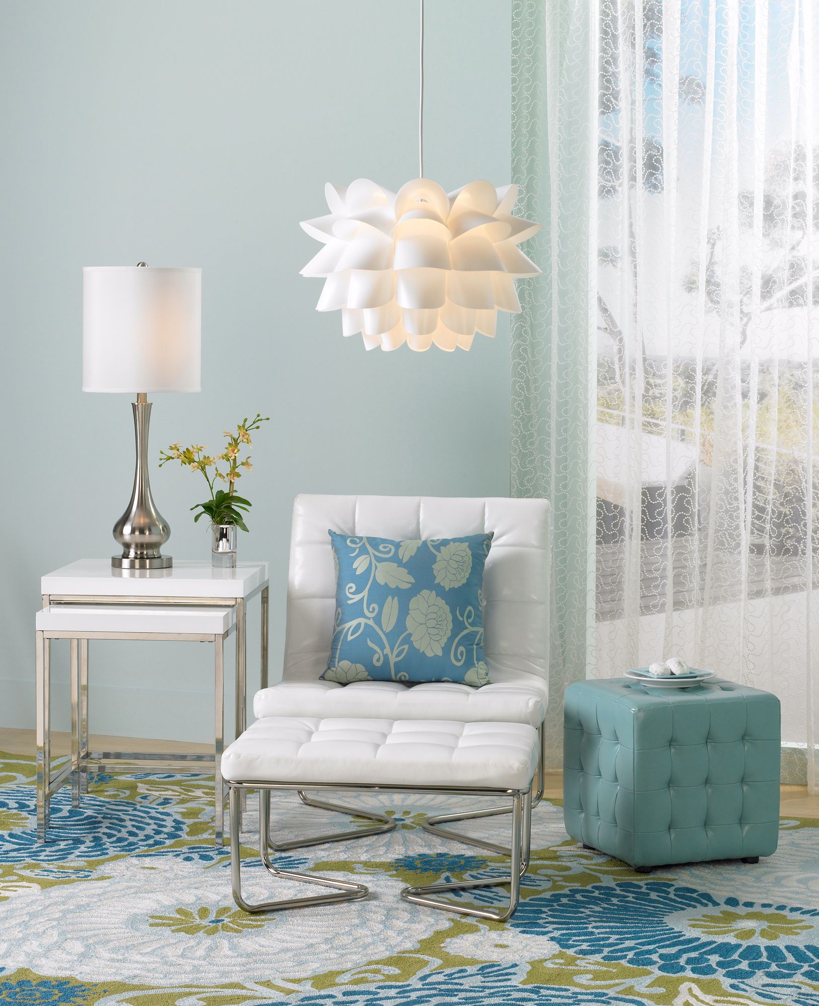 Blue and white hues plus whimsical patterns create a contemporary design.
