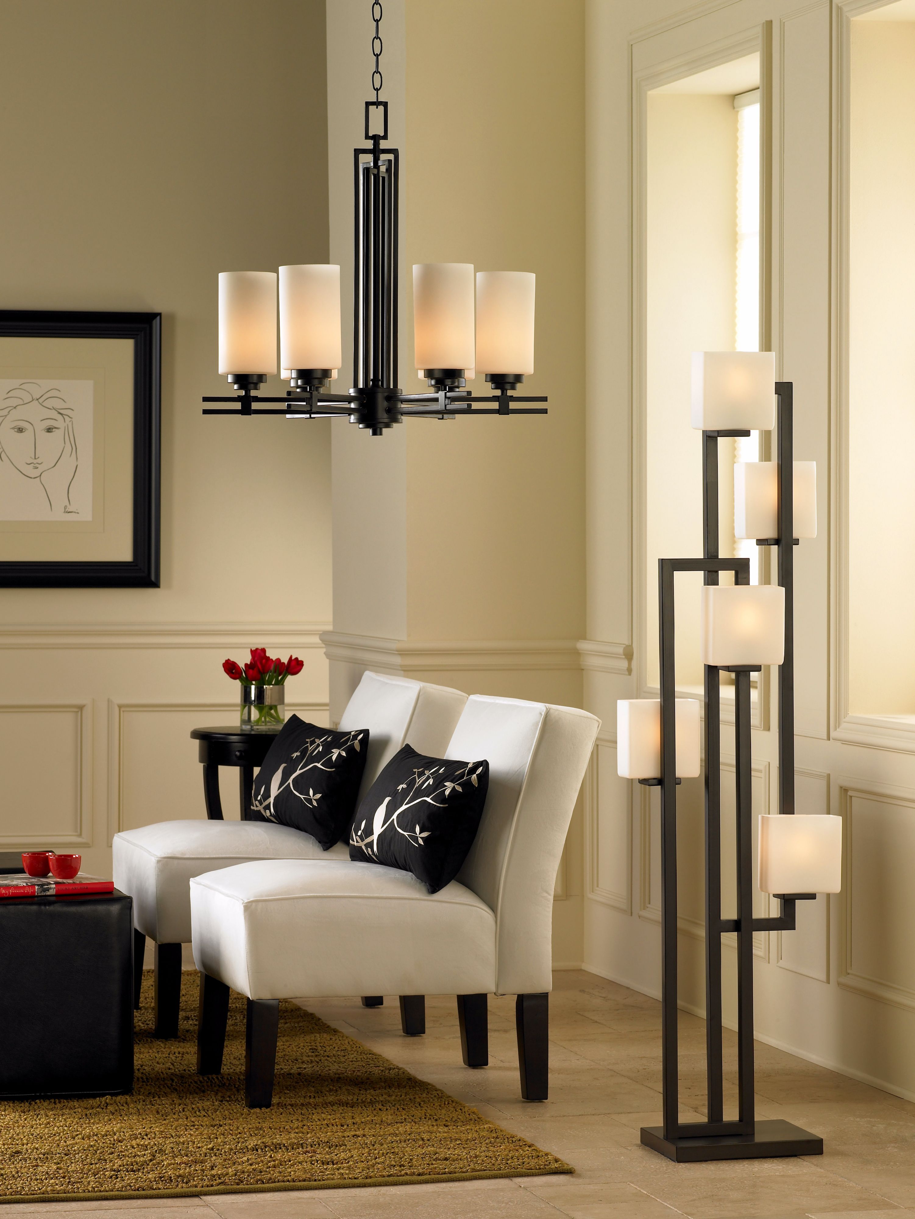 White and black is a chic color scheme in transitional living room design.