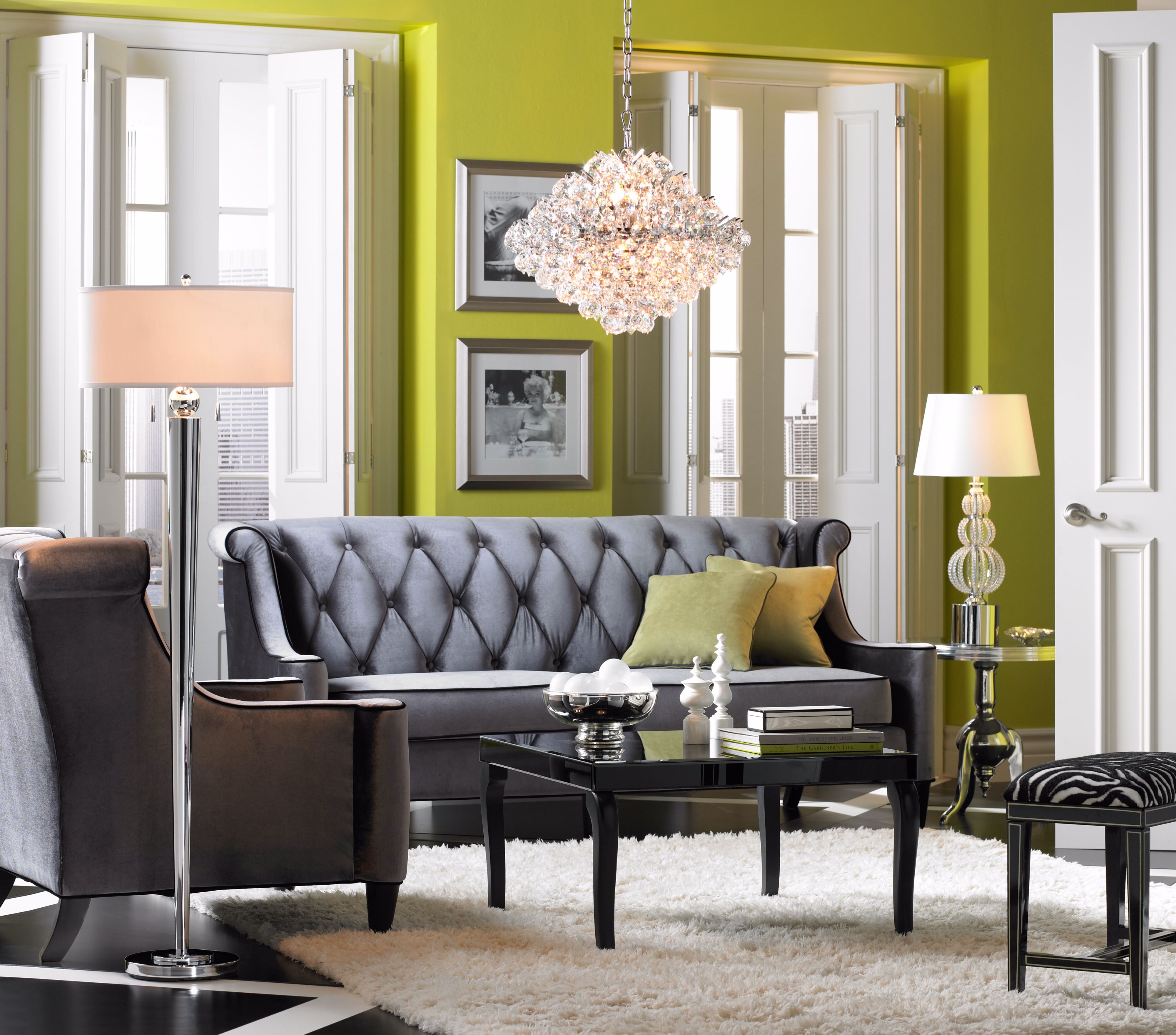 A handsome combination of rich finishes, elegant seating and crystal lighting.