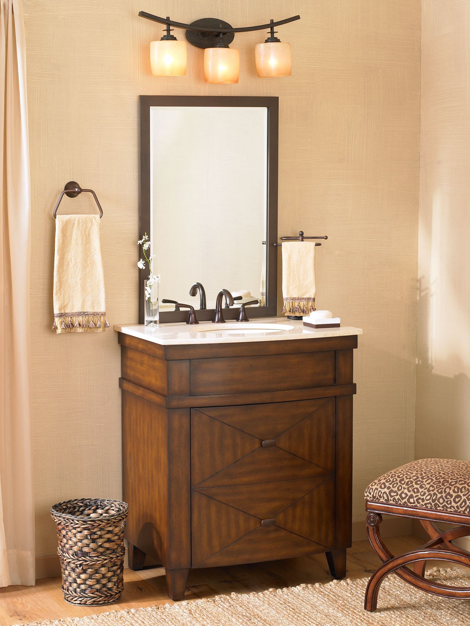 Adding warm woods and rich textures to a bathroom is a handsome decorating idea.