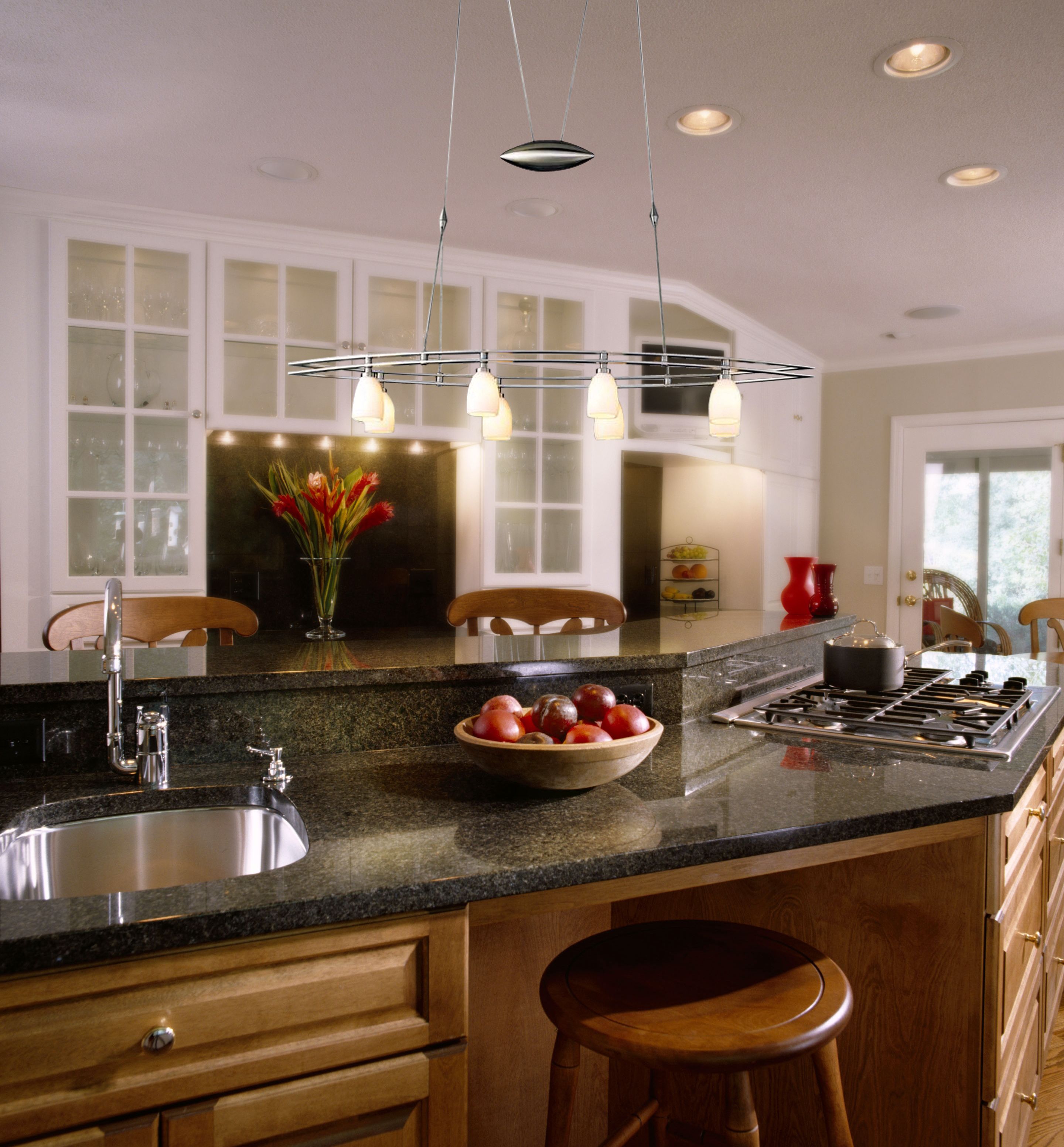 Add adjustable chandelier offers multi-use kitchen lighting.