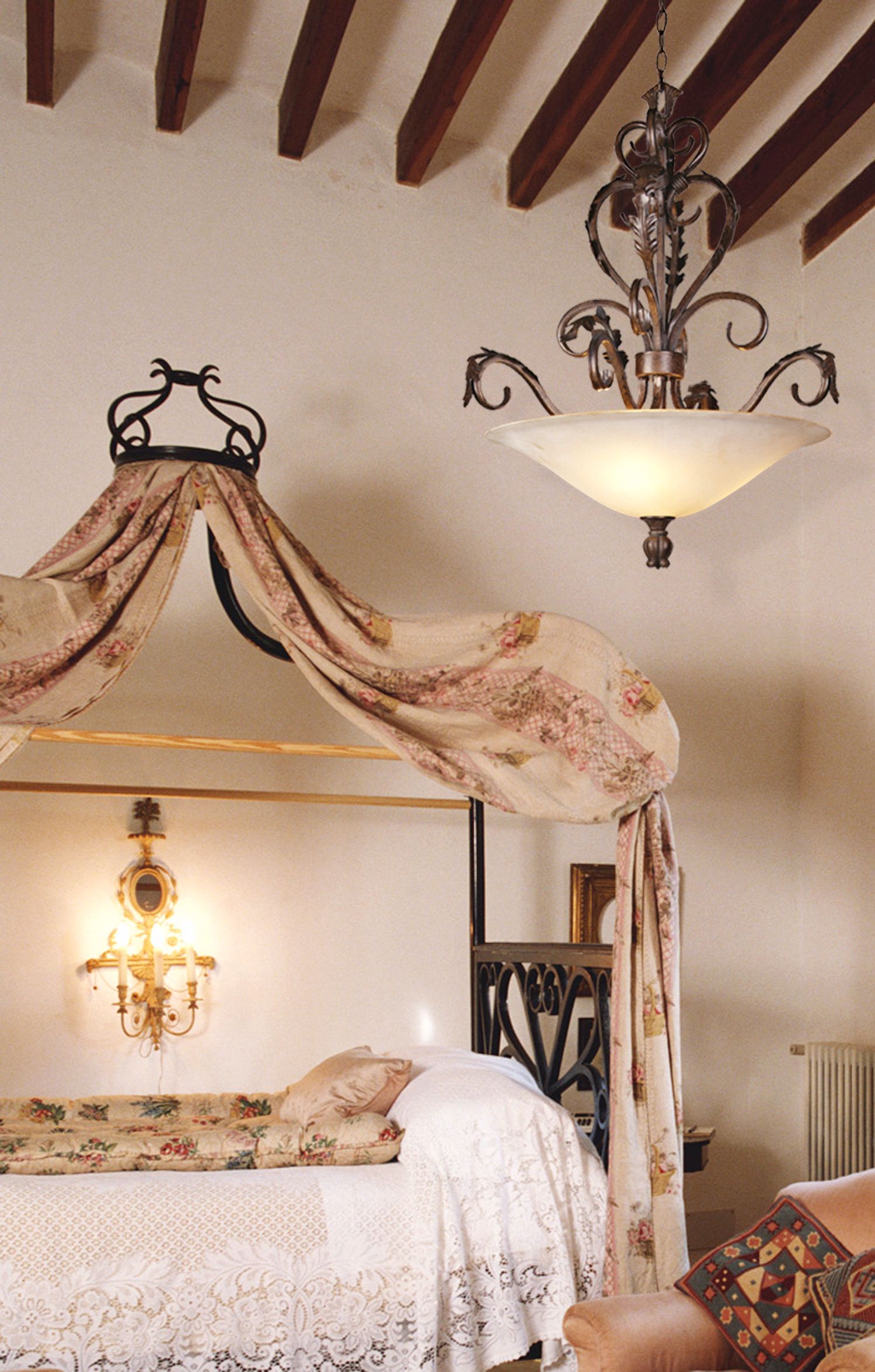 A canopy bed gives this traditional bedroom picture an elegant, feminine feel.