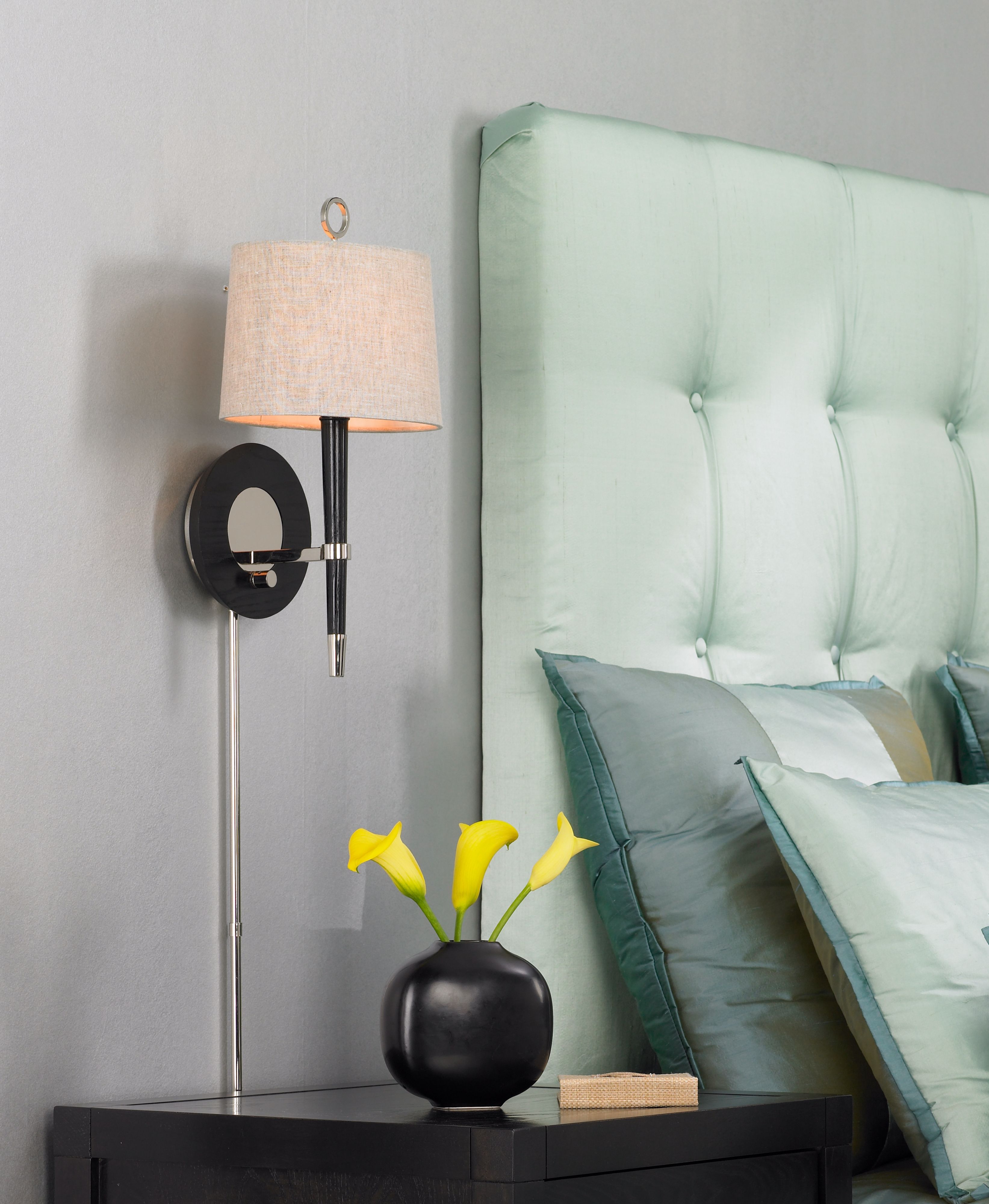 The interplay of light and dark hues is a contemporary cue.