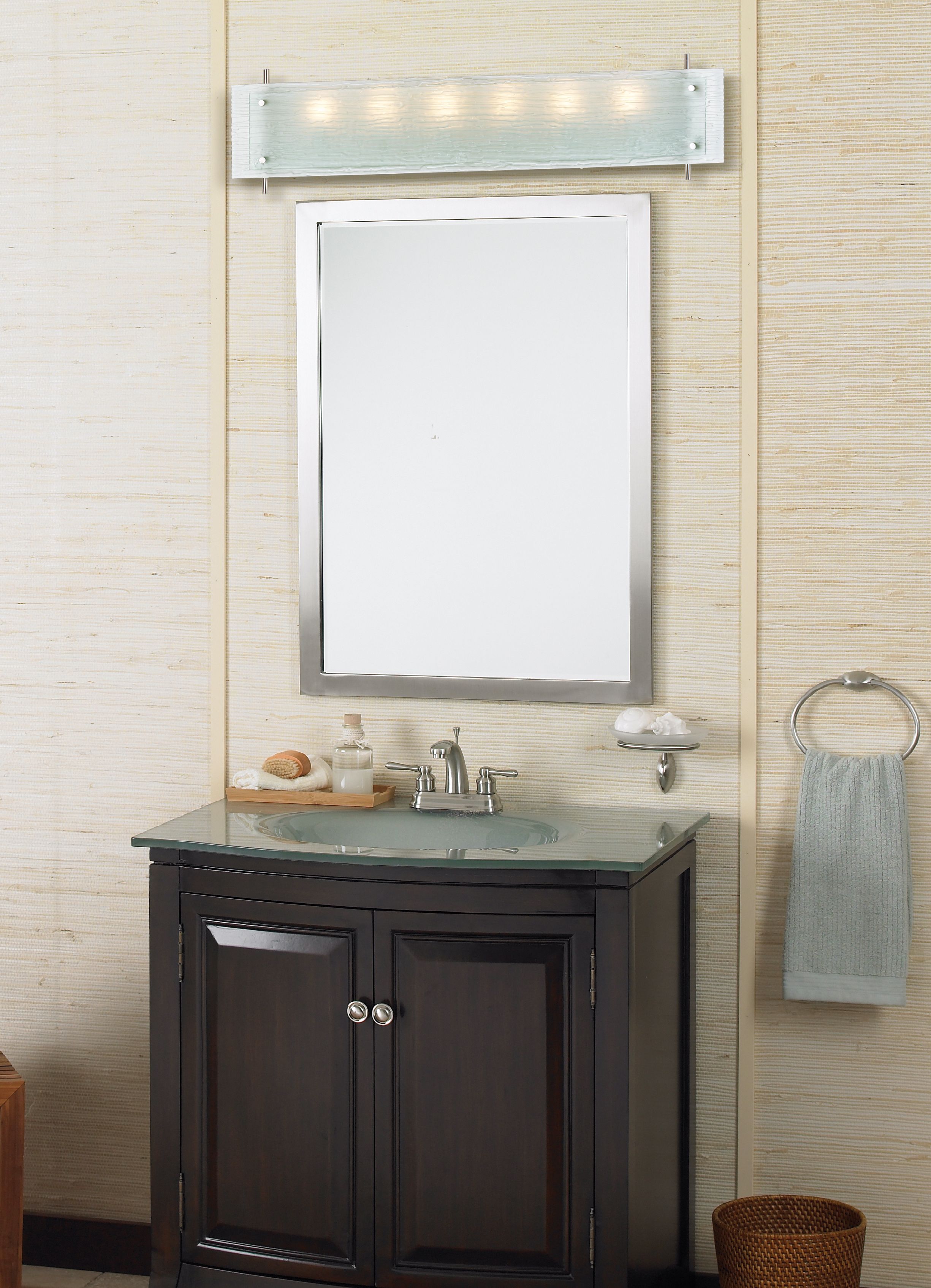 The contemporary bathroom is layered with textures to create a rich design.