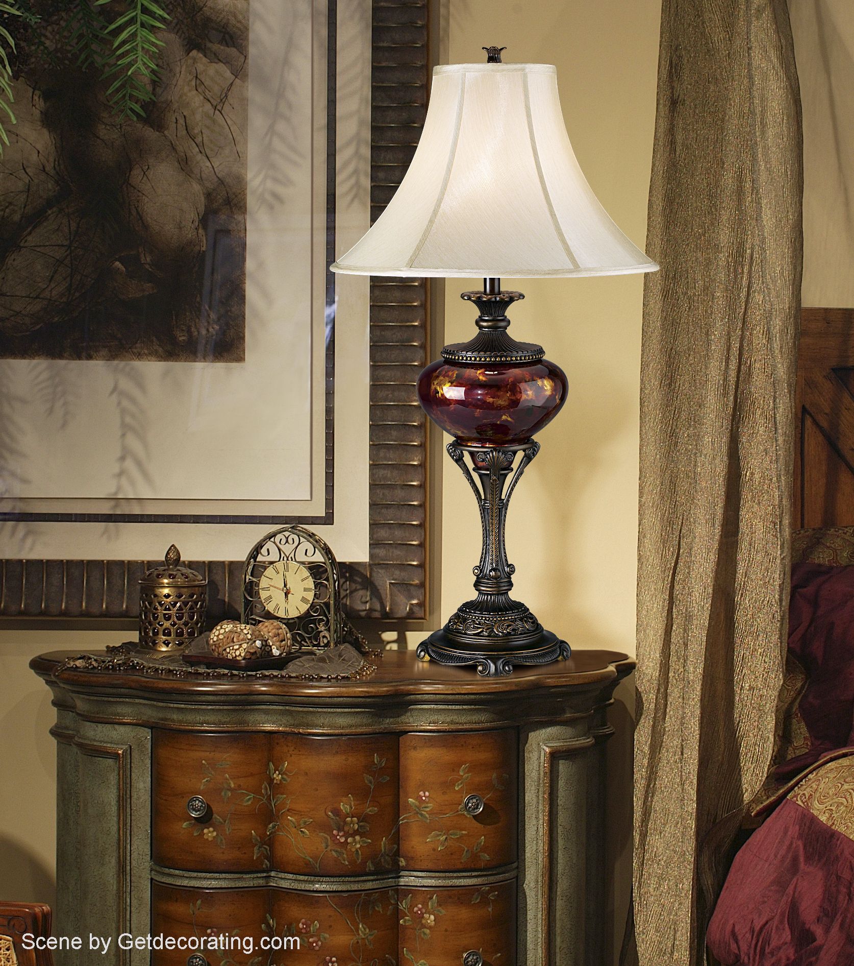 The tortoise shell urn table lamp stands out in the traditional room scene.