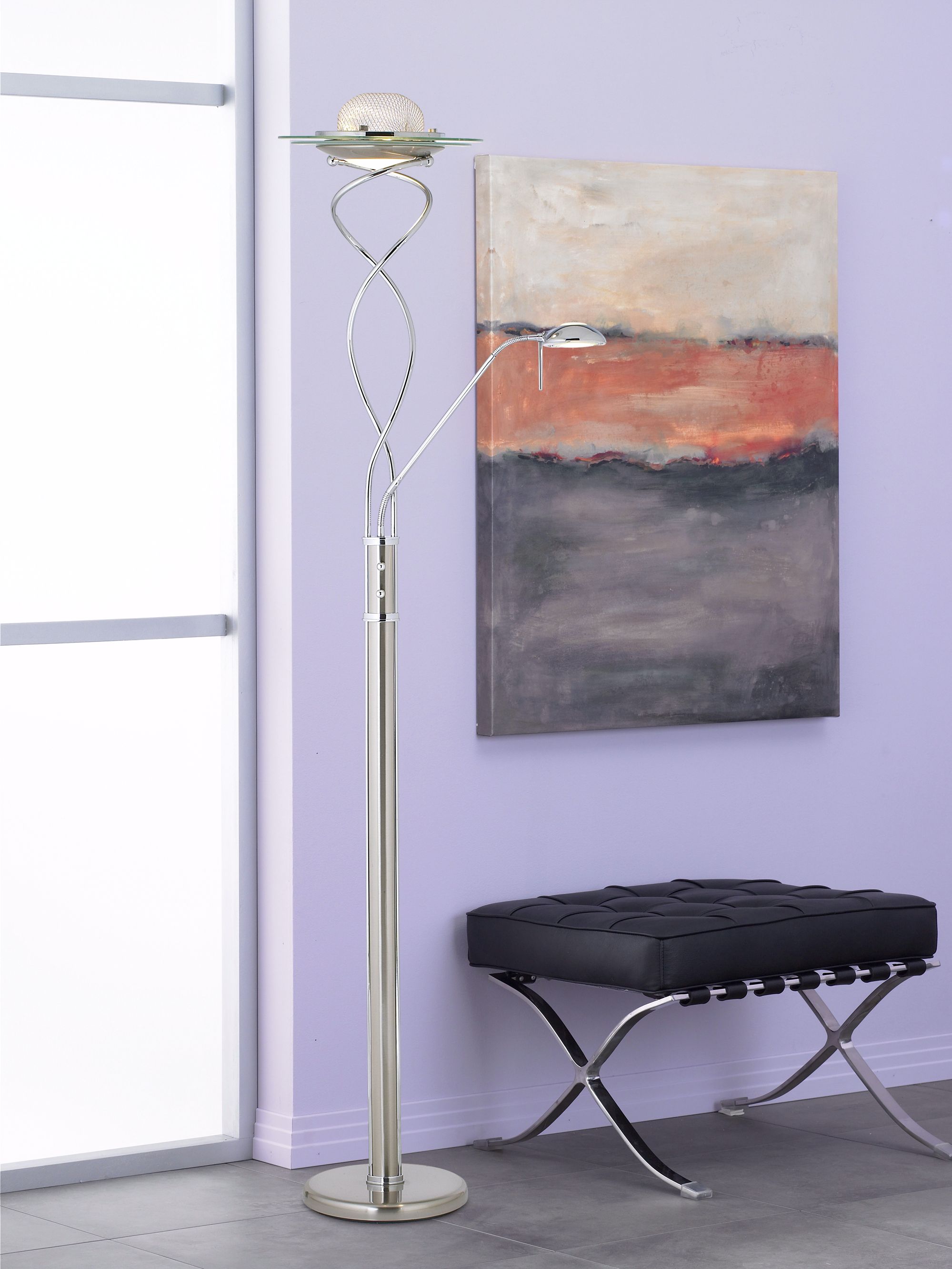 Abstract art adds modern style and color to a contemporary hallway.