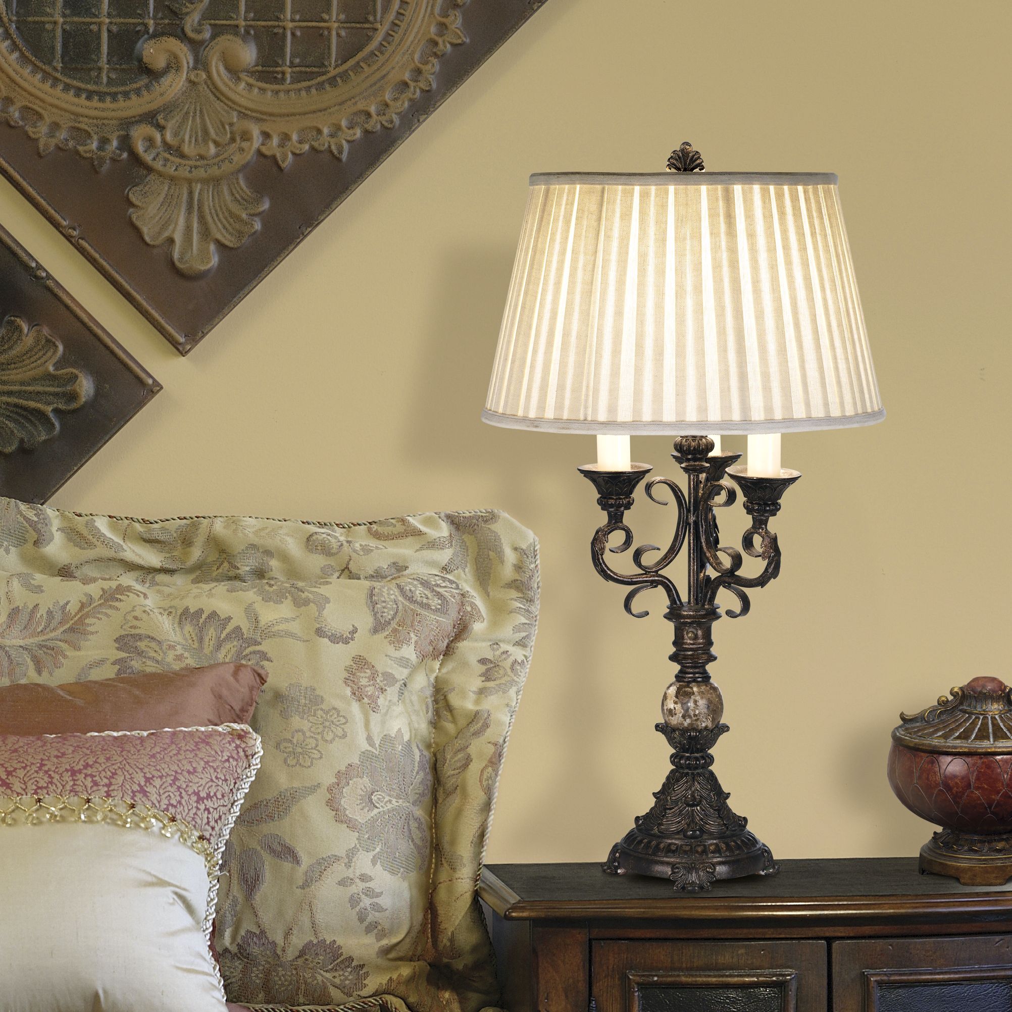 The scroll arm table lamp adds an interesting pattern to the bedroom design.