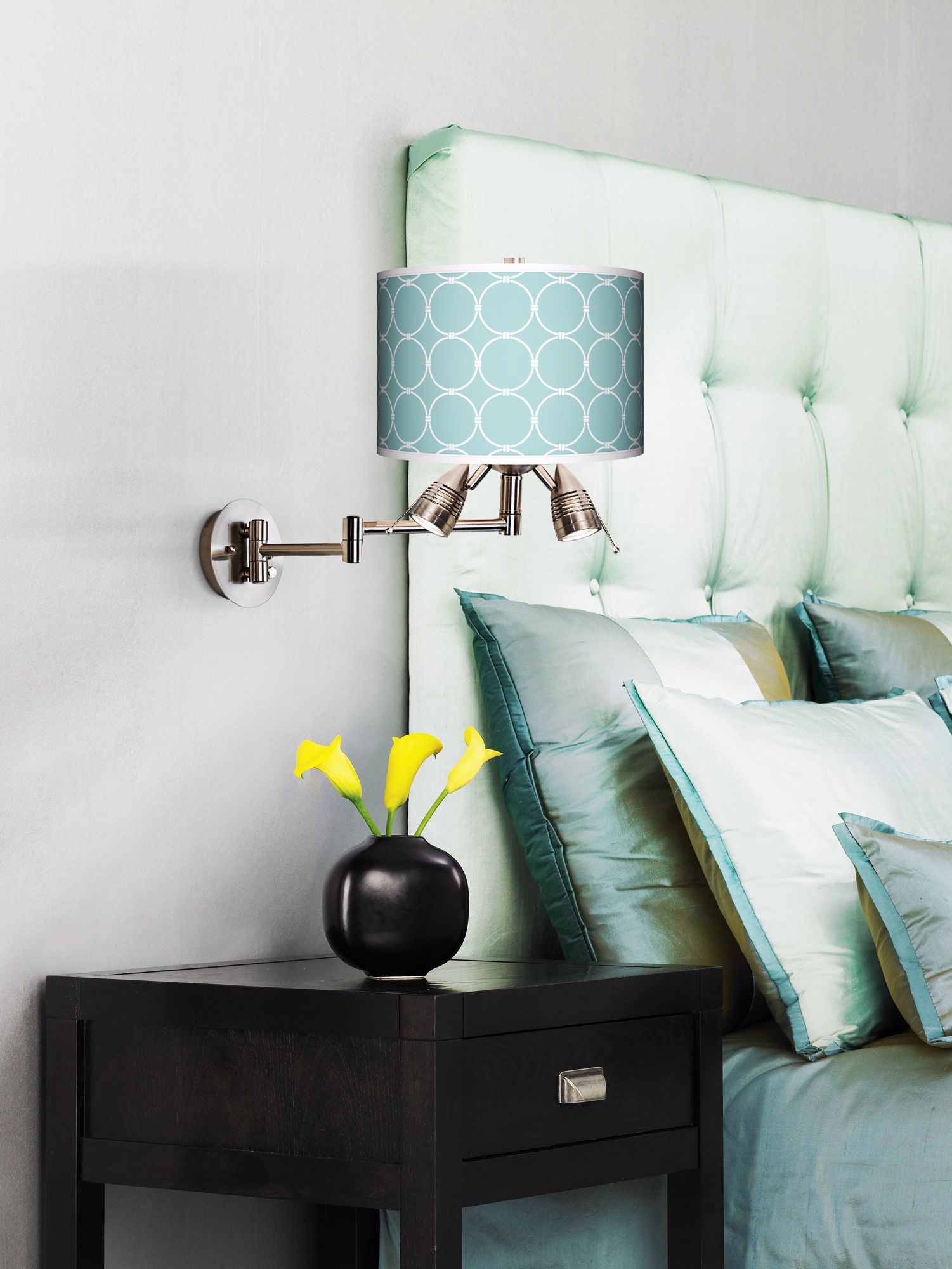 Aqua and chocolate brown is a soothing color combination for a bedroom.