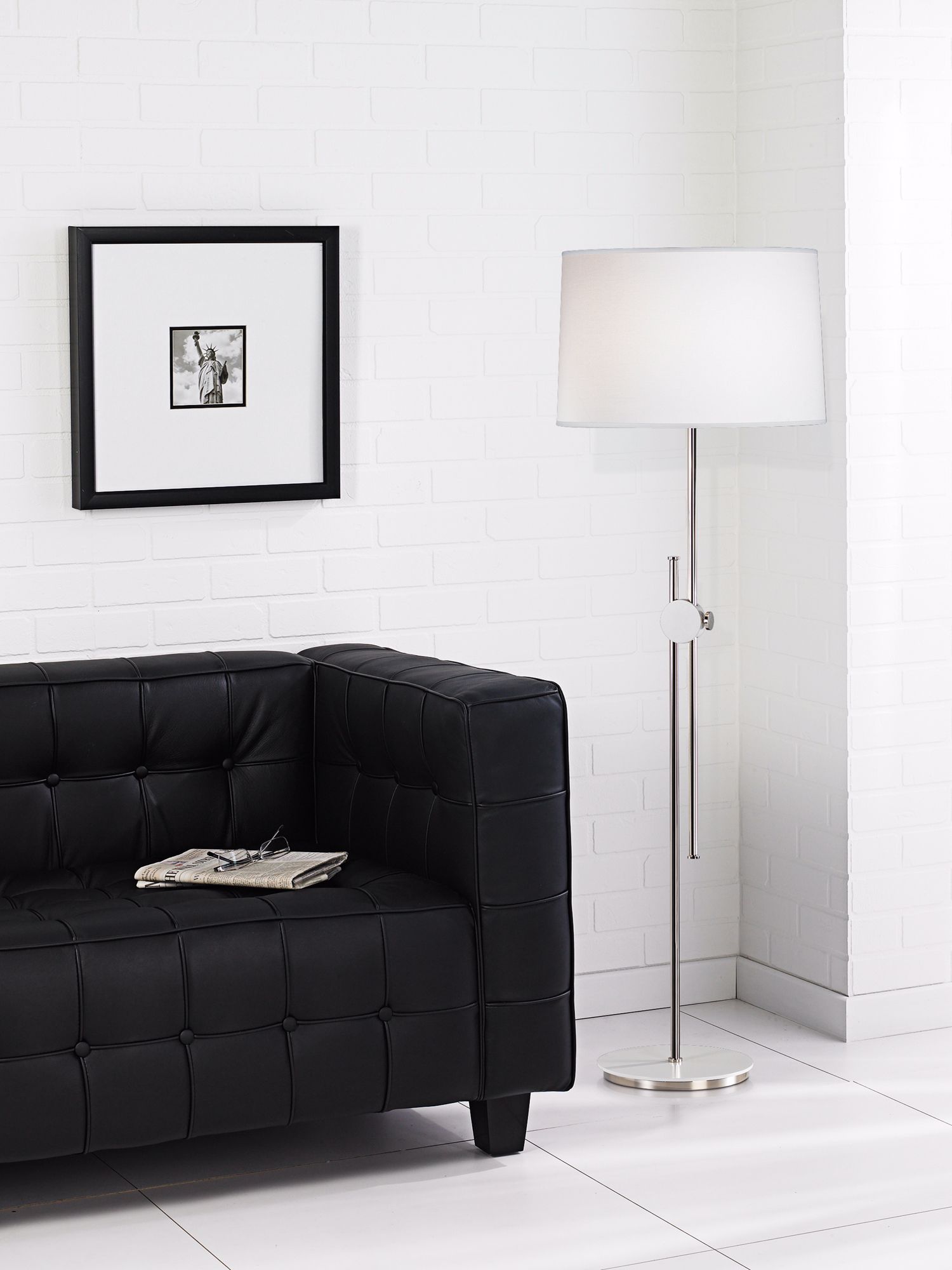 Graphic black and white pops in this contemporary living room design.