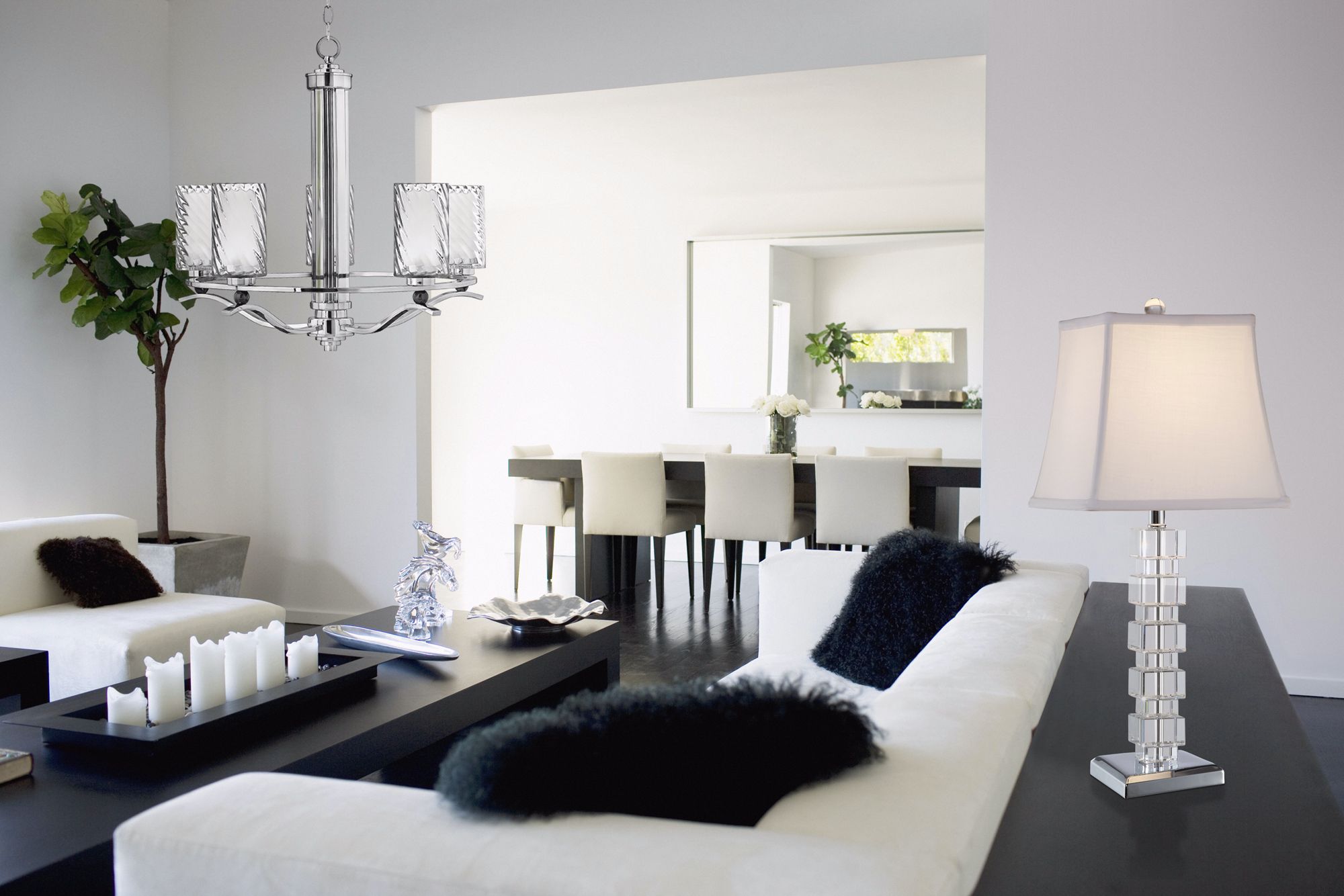 Sparkling glass and crystal accents this contemporary living room design.