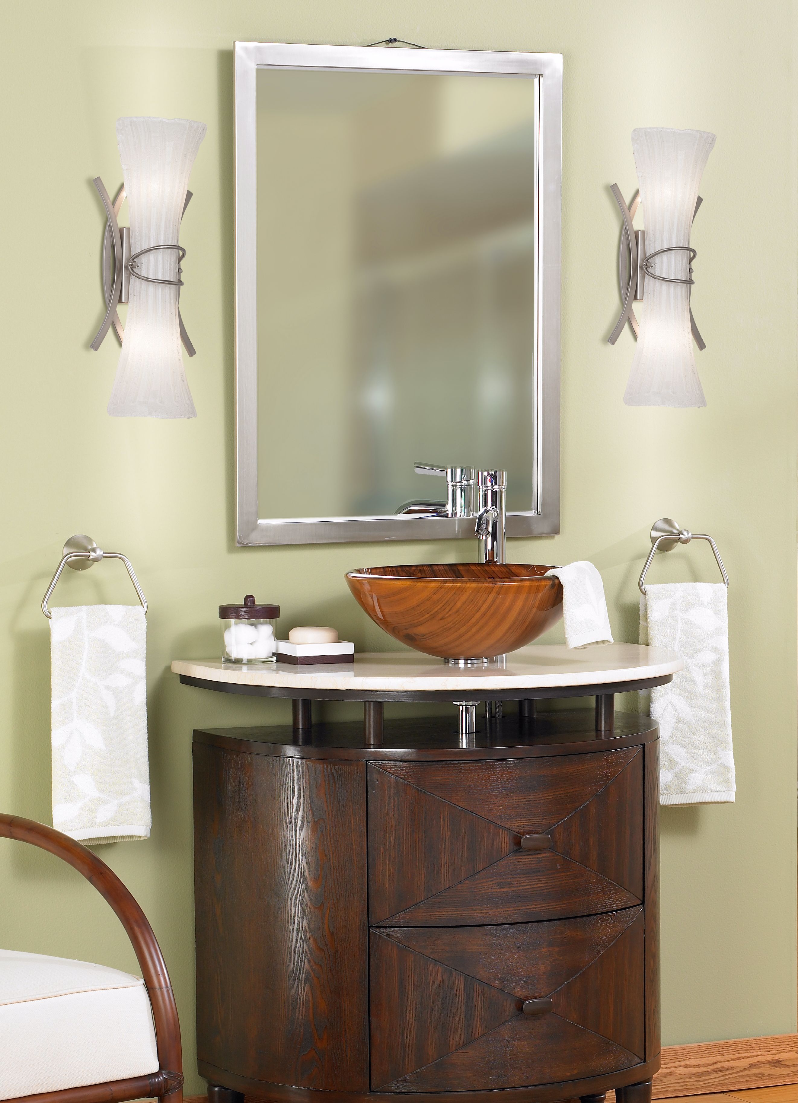 Exotic woods exude a relaxed coastal feel in this contemporary bathroom.