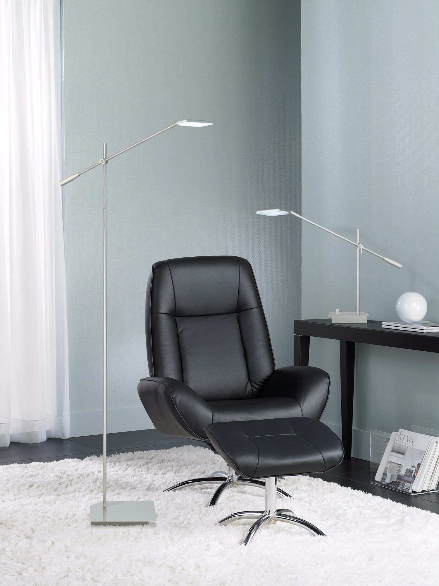 Sleek and minimalist lighting complements this modern office design picture.