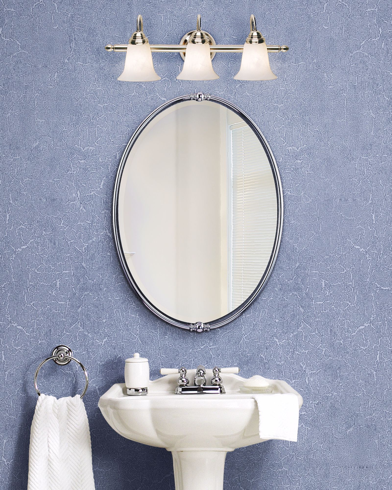 A traditional bathroom looks classic in white and chrome.