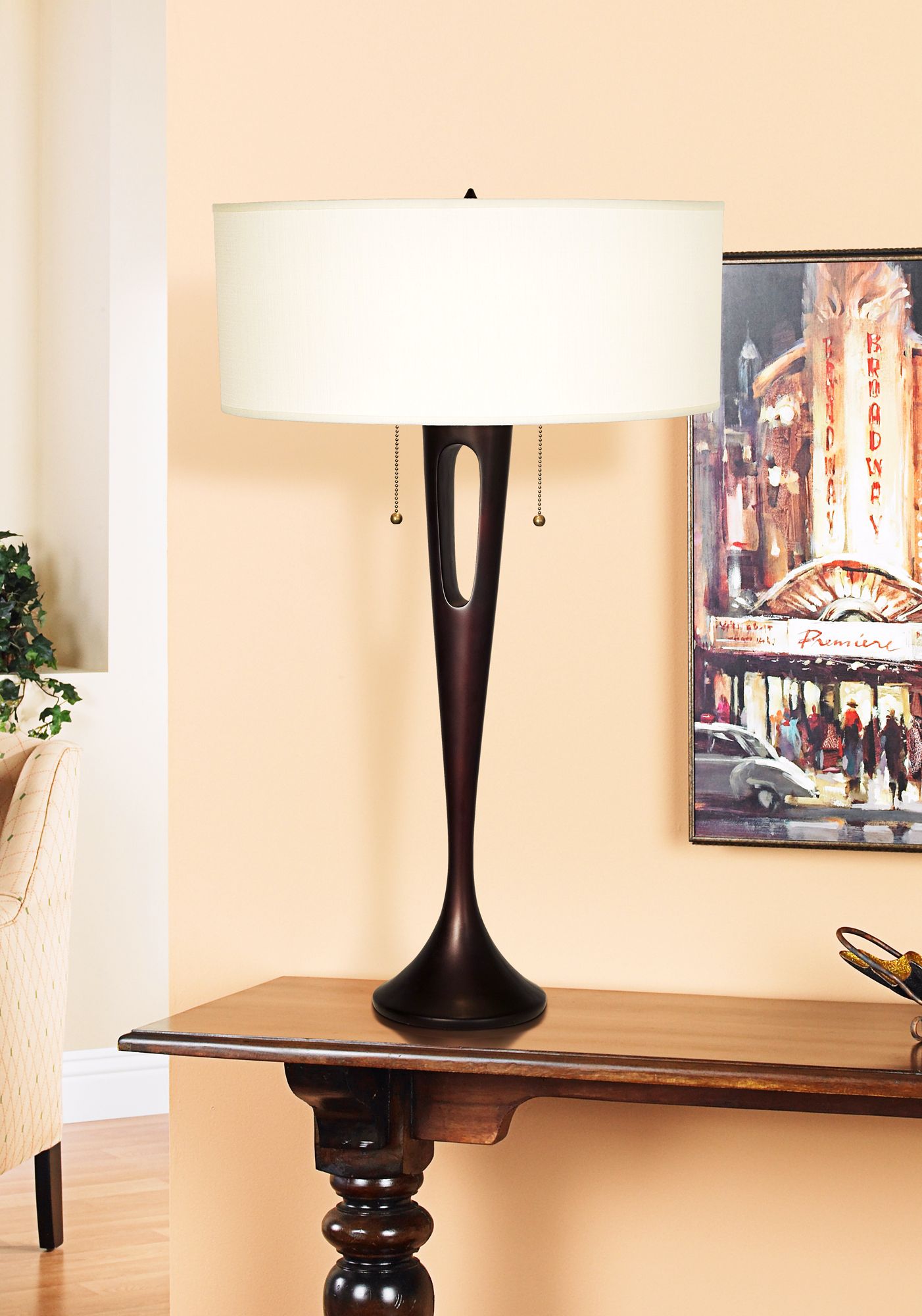 Accent a traditional sideboard with a sweeping contemporary lamp.