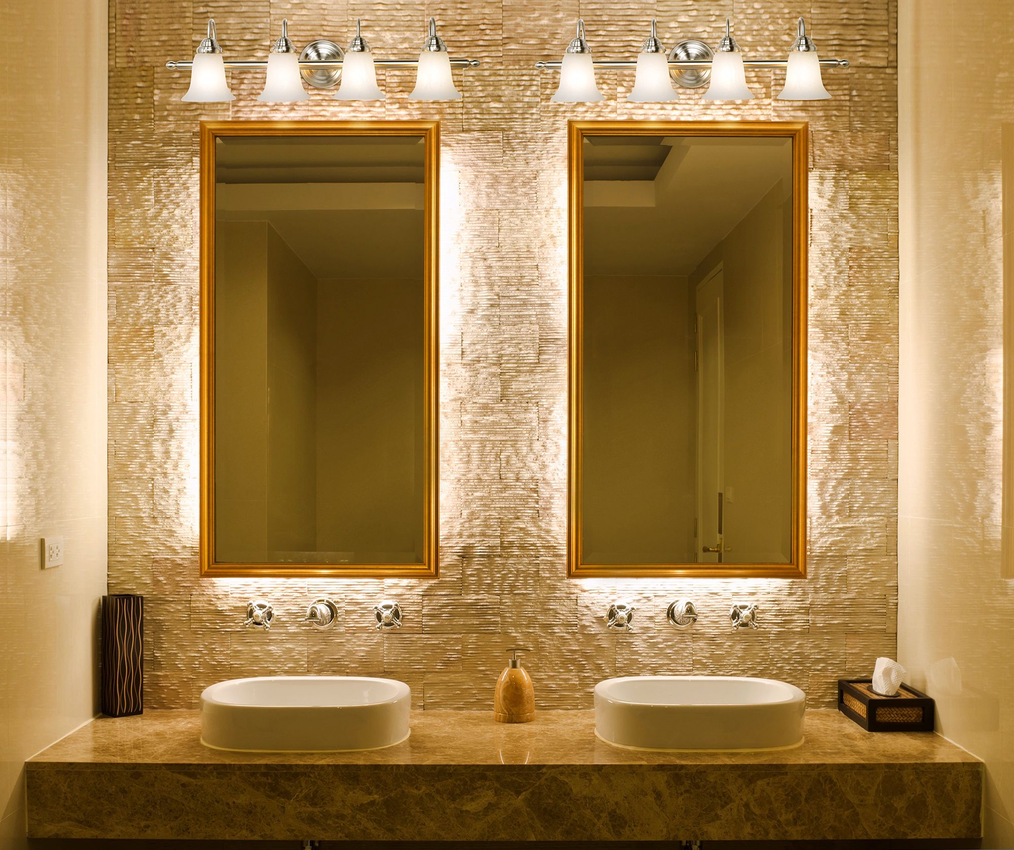 Bright bathroom lighting accents this shimmering textured wall.