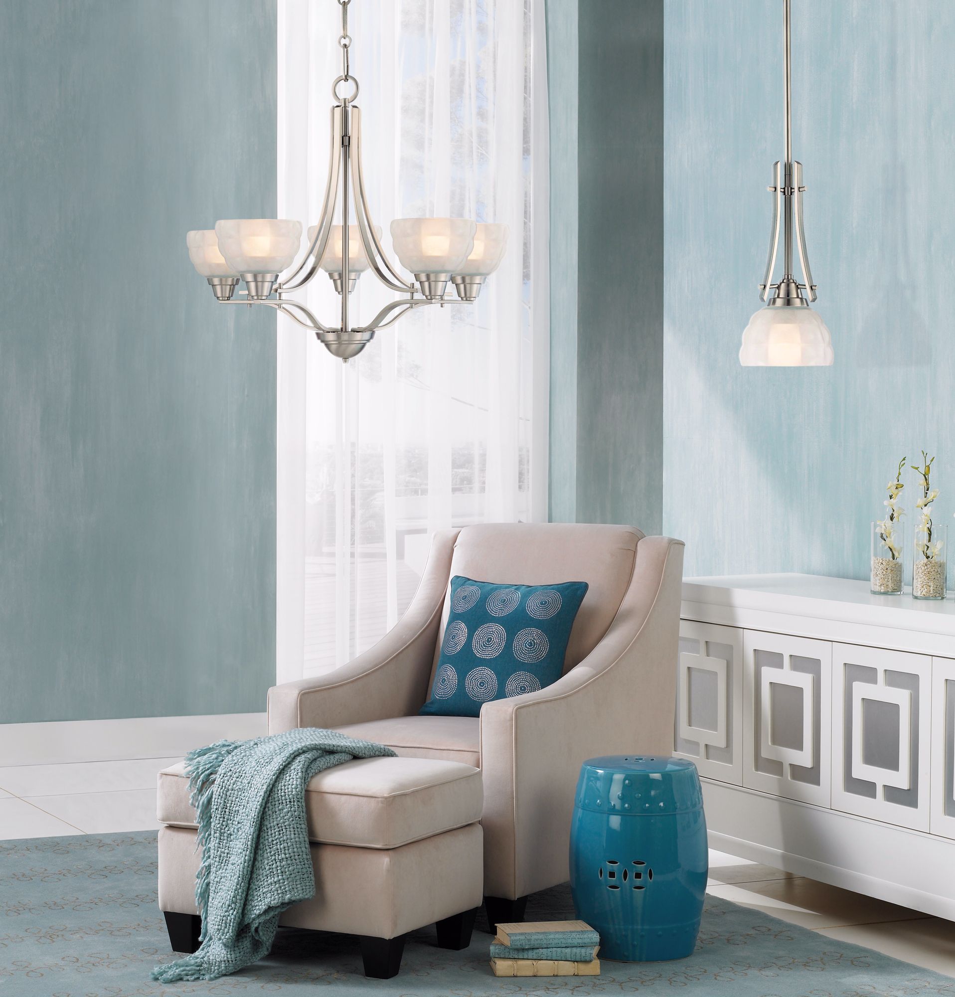 contemporary aesthetic, blue wall color, blue accessories, white sideboard, gla