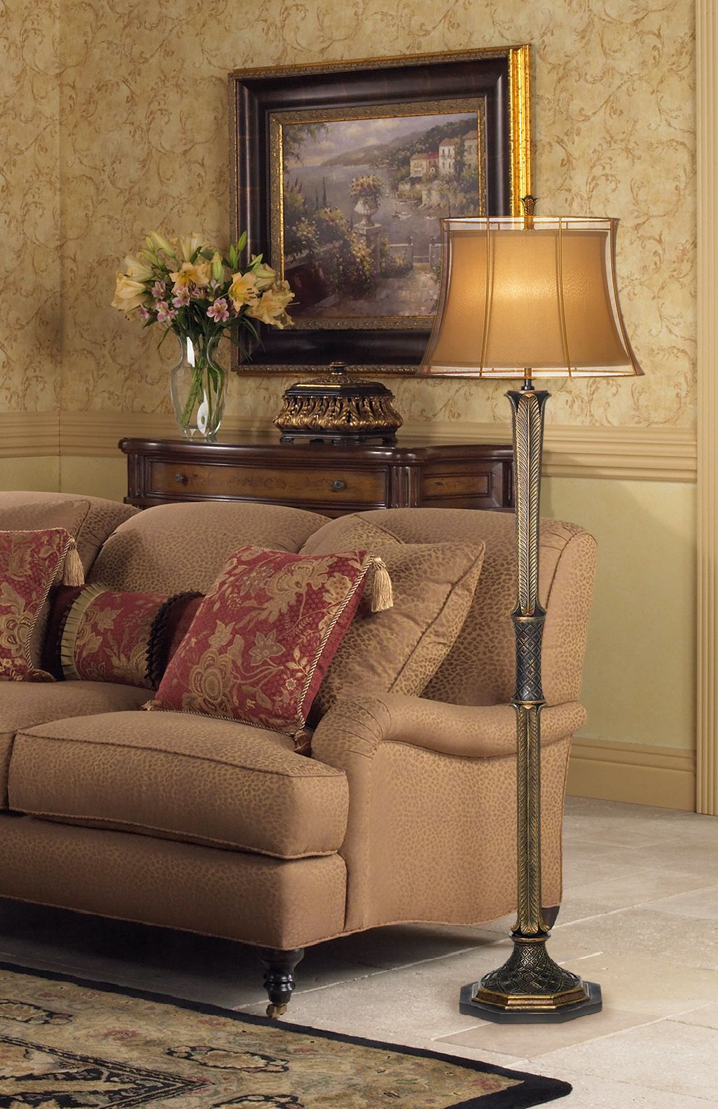 A richly patterned rug accents a traditional living room picture.