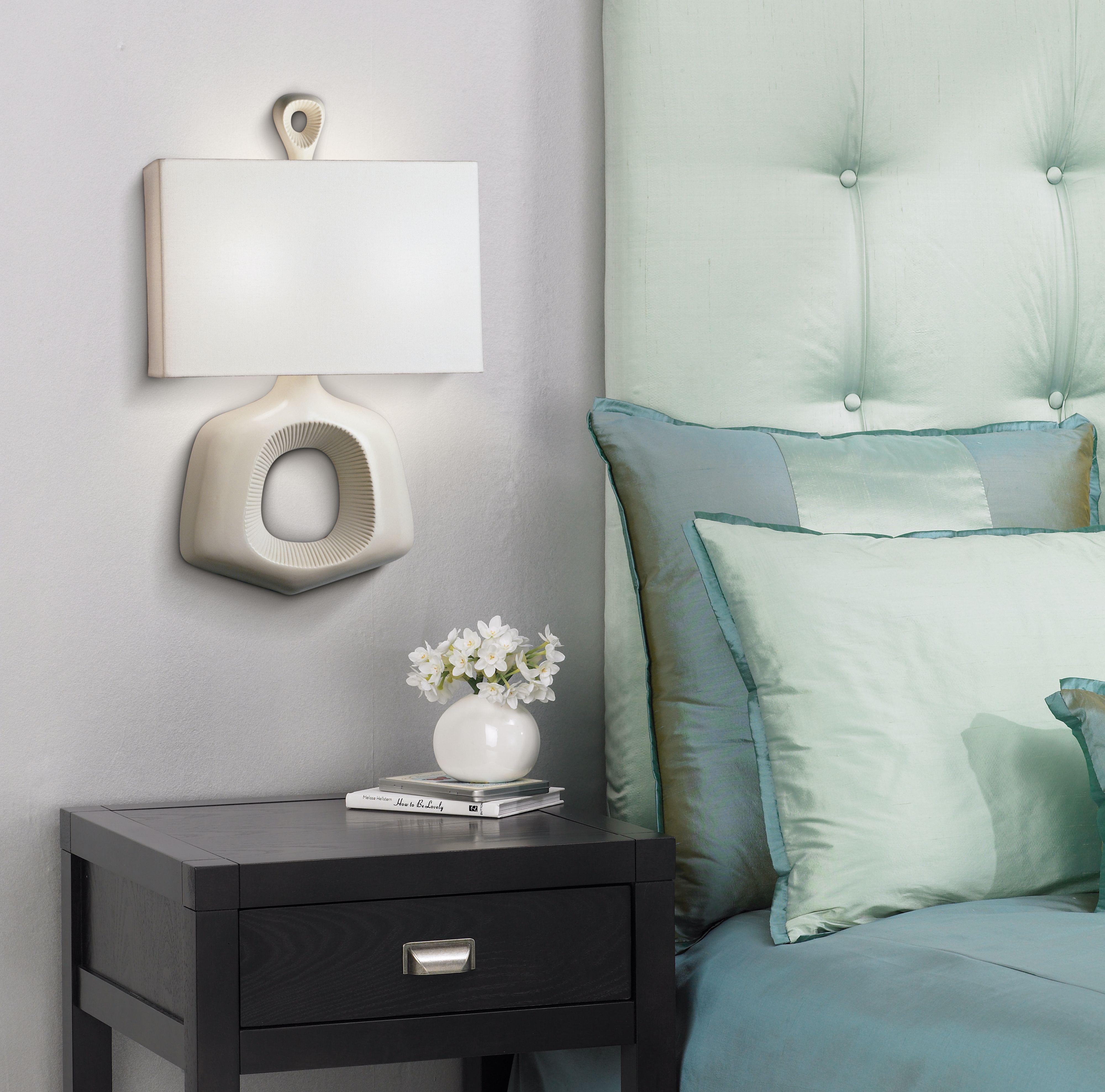 This Jonathan Adler wall sconce serves as both accent lighting and wall art!