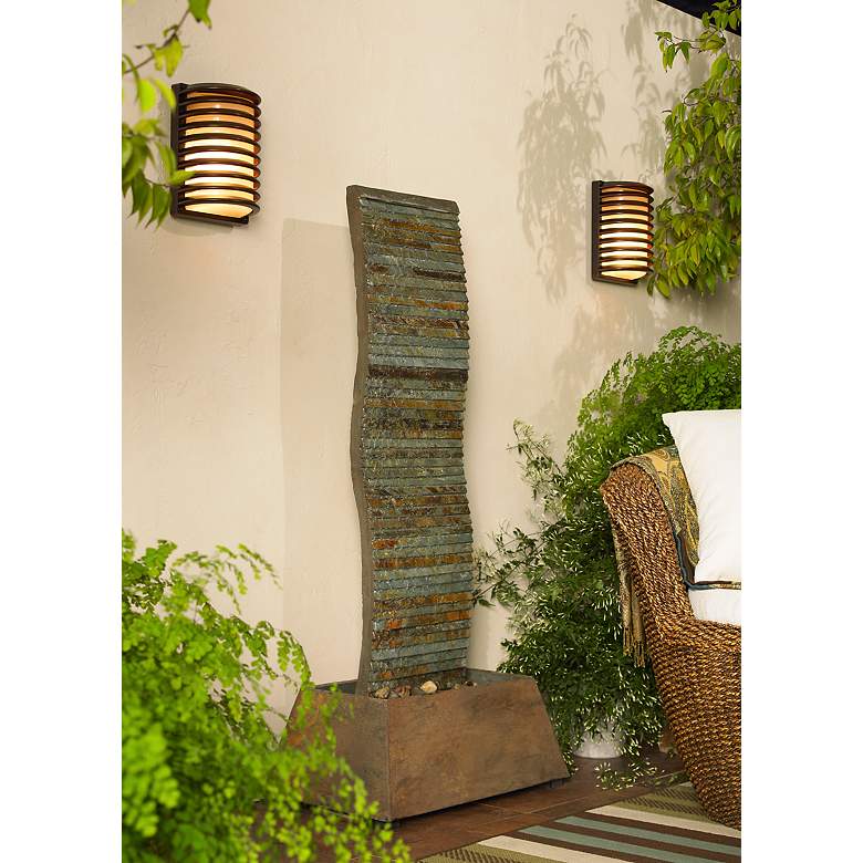 Image 1 John Timberland Bronze Grid 10" High Modern Outdoor Wall Light in scene