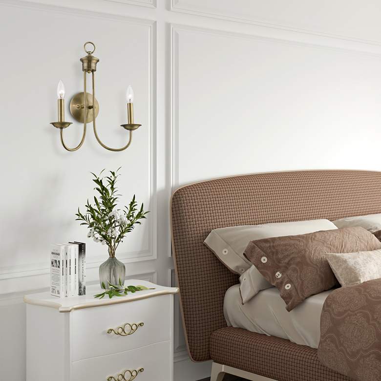 Image 1 Estate 2 Light Antique Brass Double Sconce in scene