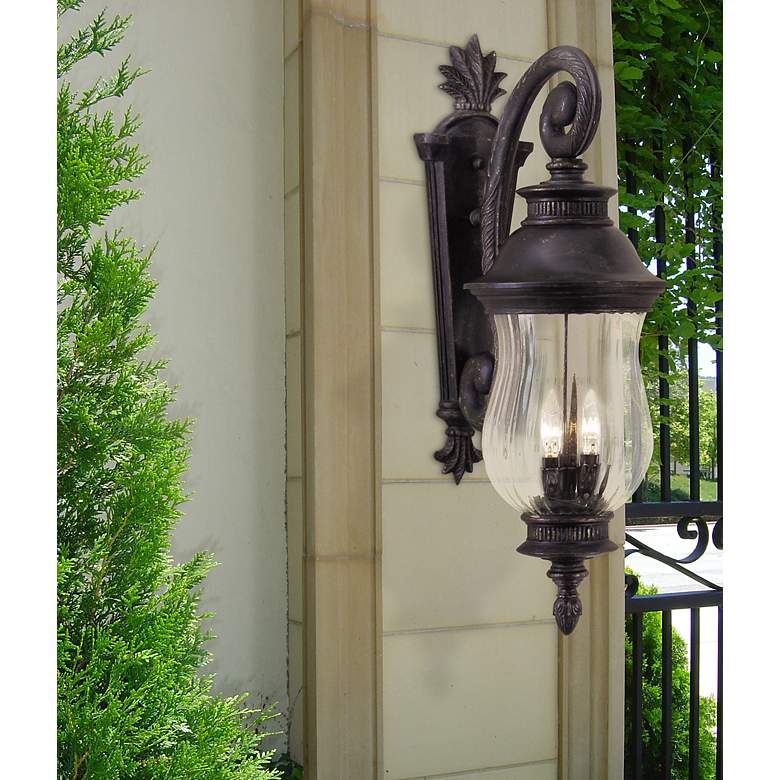 Image 1 Minka Newport Collection 28" Traditional Scroll Arm Outdoor Wall Lamp in scene
