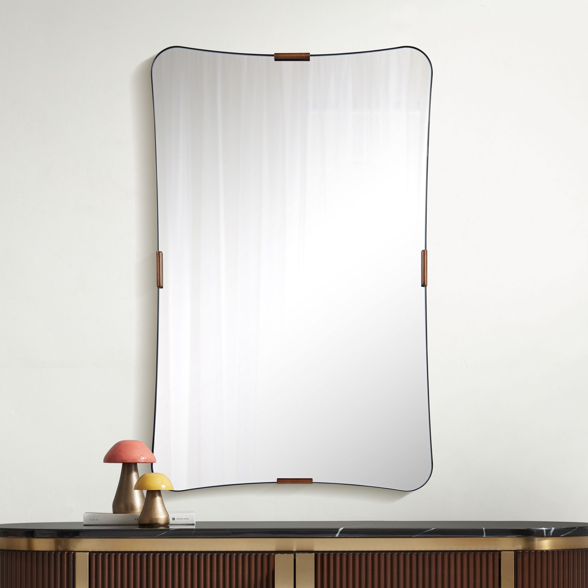 Uttermost Saranac 24x38 Black and Brass Wall Mirror in scene