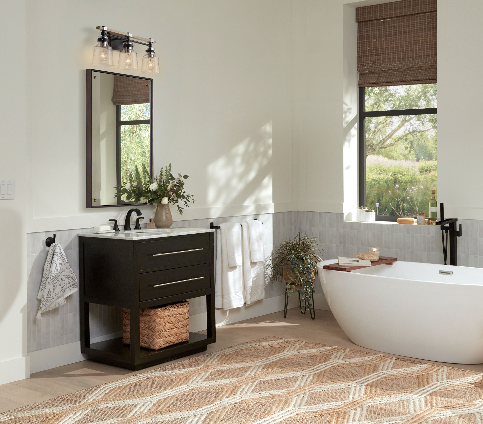 Image 1 Uttermost Batavia 24x38 Dark Bronze Wall Mirror with Button Detail in scene