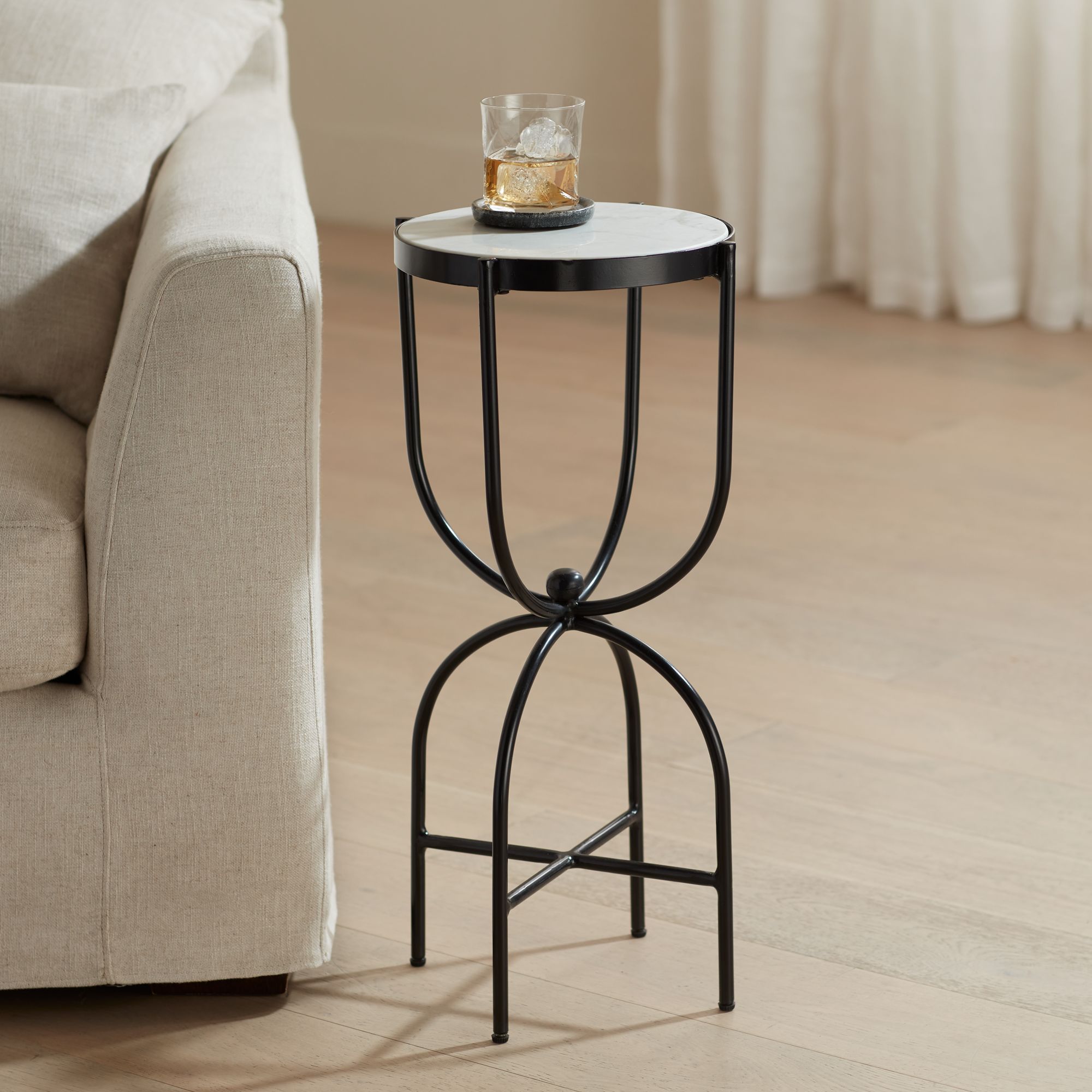 Image 1 Possini Euro Bronte 25 1/2" High White Marble and Black End Table in scene