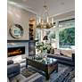 1_Beau 26" Wide Rubbed Brass 6-Light Chandelier in scene