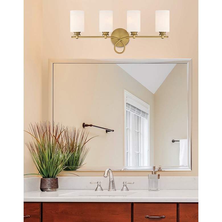 Image 1 Savoy House Woodbury 28" Wide Warm Brass 4-Light Bath Light in scene