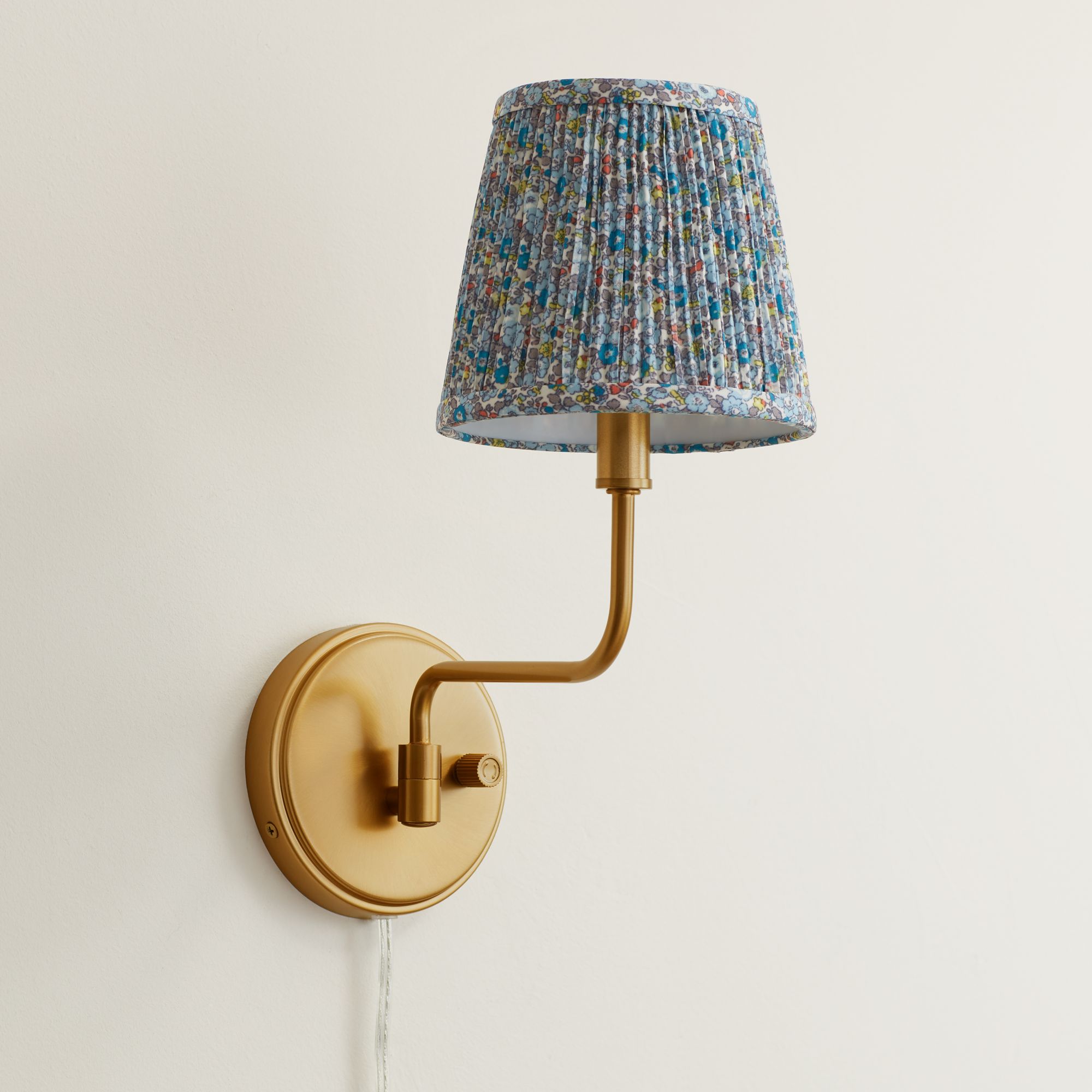 Image 1 Ophelia 9 1/2"H Warm Brass Plug-In Wall Sconce Blue Floral Shade in scene