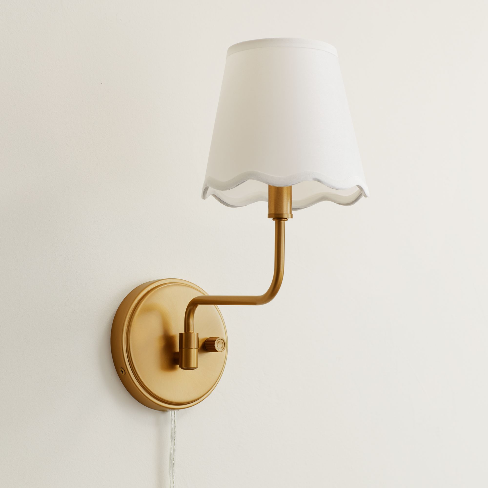 Image 1 Ophelia 9 1/2"H Warm Brass Plug-In Wall Sconce White Scallop Shade in scene