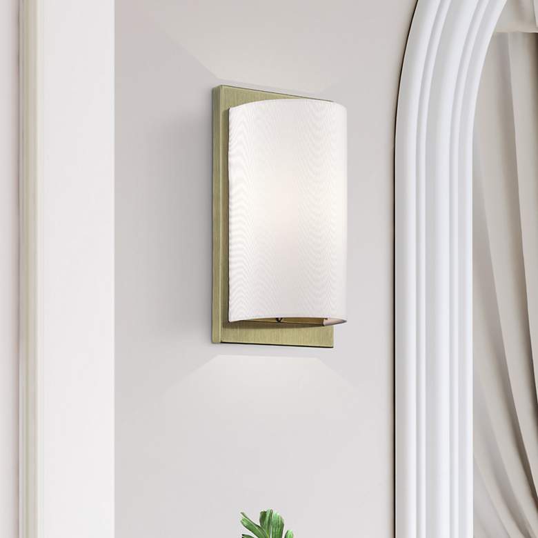 Image 1 1 Light Antique Brass ADA Sconce with Hand Crafted Off-White Fabric Shade