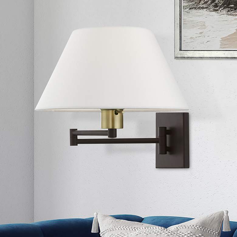 Image 1 1 Light Bronze with Antique Brass Accent Swing Arm Wall Lamp
