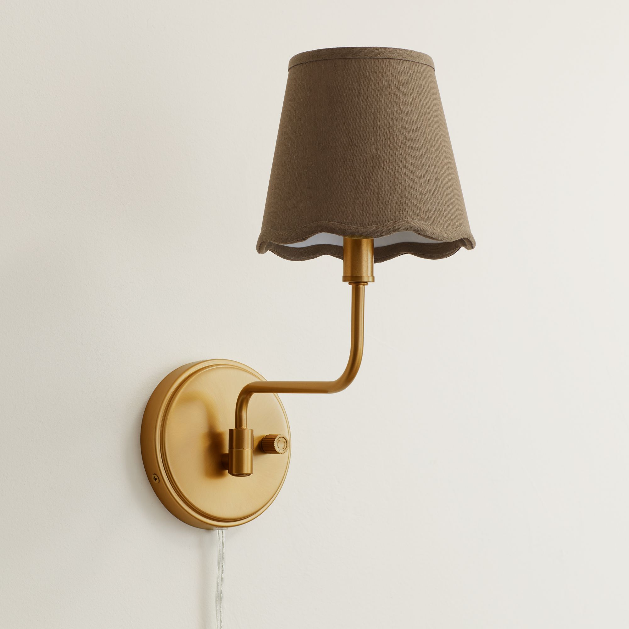 Image 1 Ophelia 9 1/2"H Warm Brass Plug-In Wall Sconce Dark Sage Scallop Shade in scene