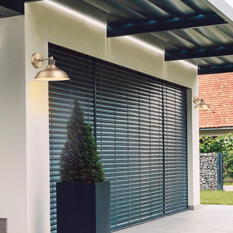 Image 1 Sutton 9" High Matte Brass Indoor/Outdoor Wall Sconce in scene